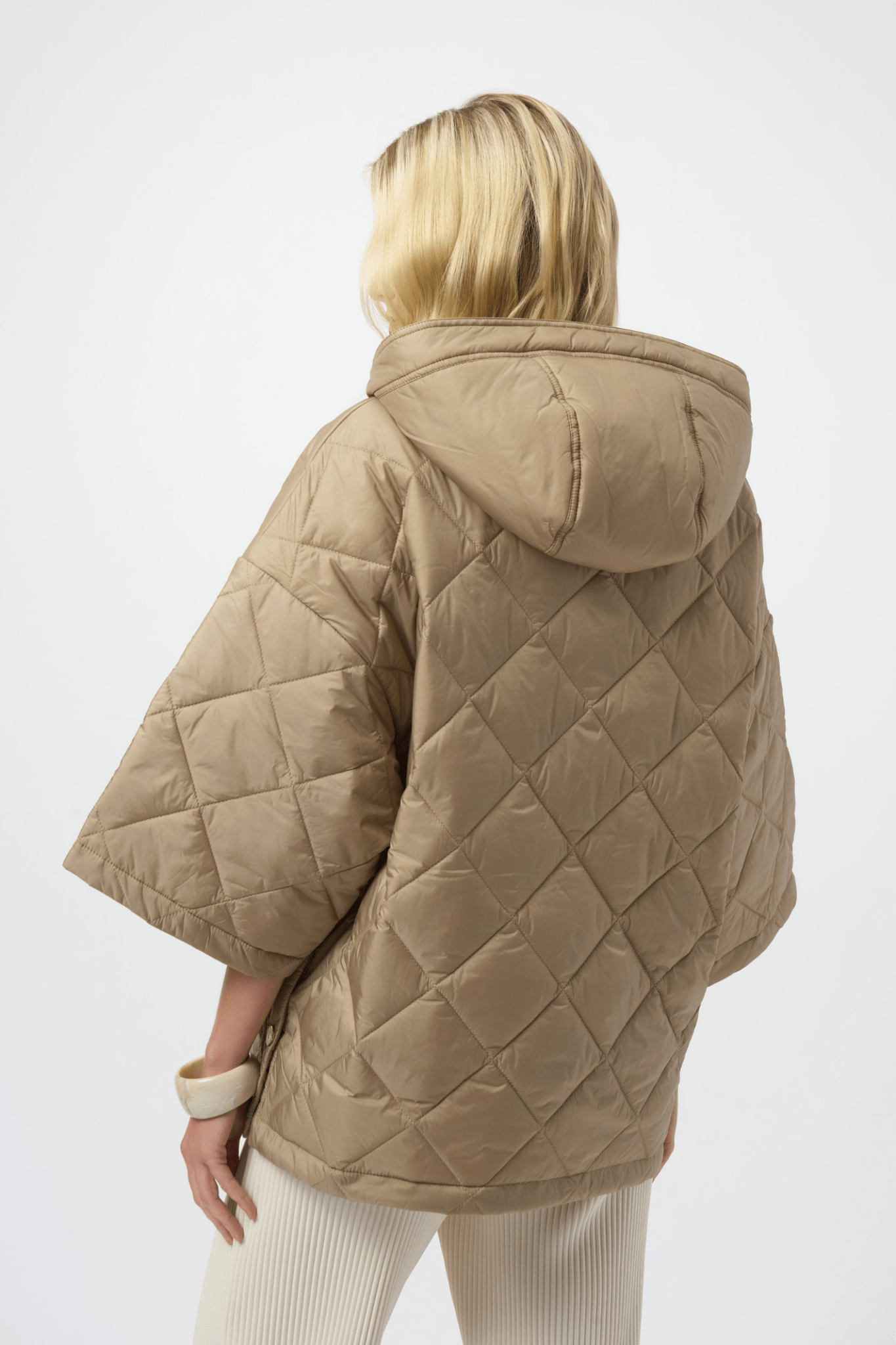 Joseph Ribkoff gold quilted hooded jacket with diamond pattern and kimono sleeves