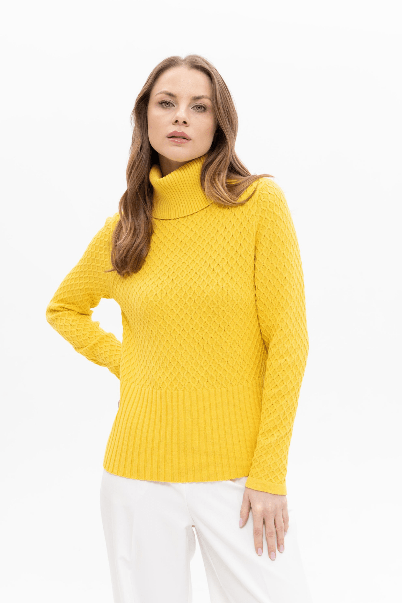 Passioni 18129 Yellow Roll Neck Jumper. Featuring a textured diamond knit design, cosy roll neck, and wide ribbed hem for a flattering shape.