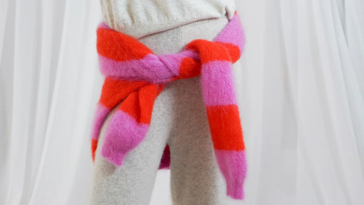 Discover TWNS The Label at Dotique – a contemporary Belgian knitwear brand designed for women who love timeless style with a confident use of colour. Combining modern silhouettes with exceptionally soft premium yarns, every piece is created to become a wa
