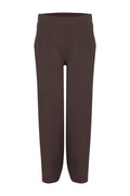 Shop the Margittes Barrel Joggers in Chocolate Brown at Dotique. Soft cotton-modal joggers with a modern barrel-leg silhouette and comfortable stretch fit, perfect for everyday wear.