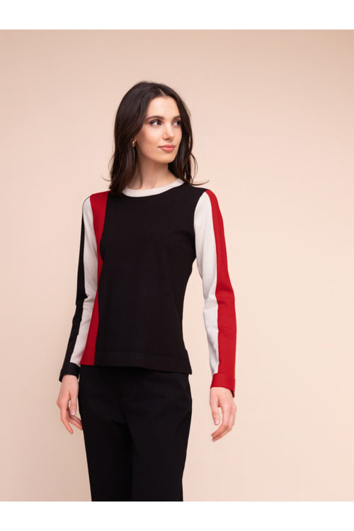 Model wearing Alison Sheri A48042 Colour Block Knit Top with red, black, and white panels by Alison Sheri. Shop Alison Sheri at Dotique.