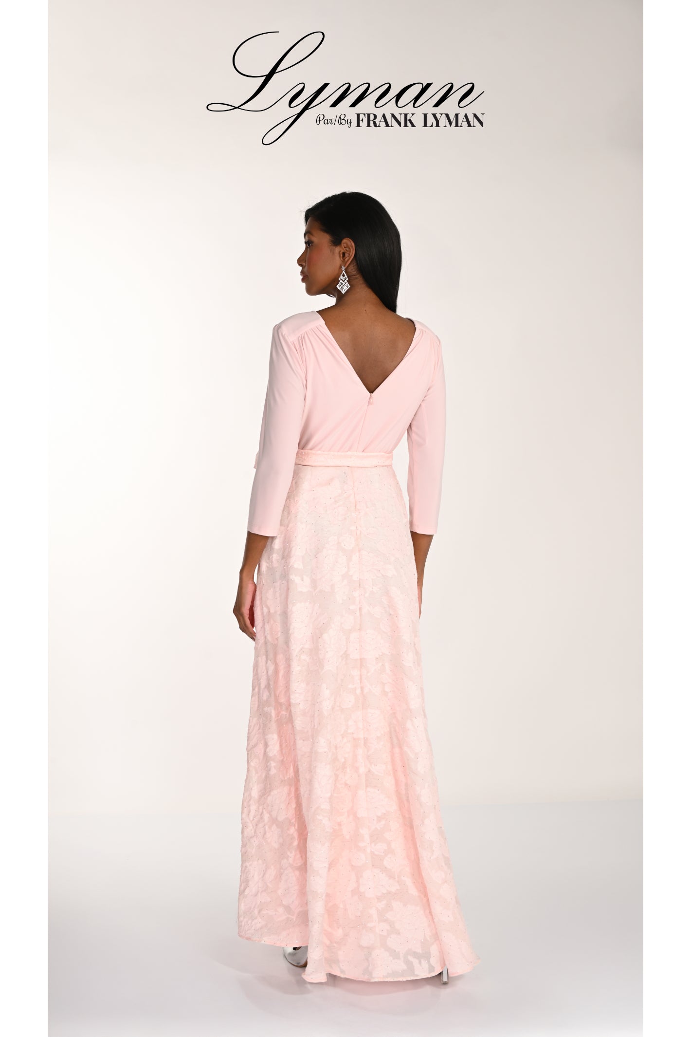 Model wearing Frank Lyman 268157 Blush Occasion Maxi Dress by Frank Lyman, shop Frank Lyman at Dotique