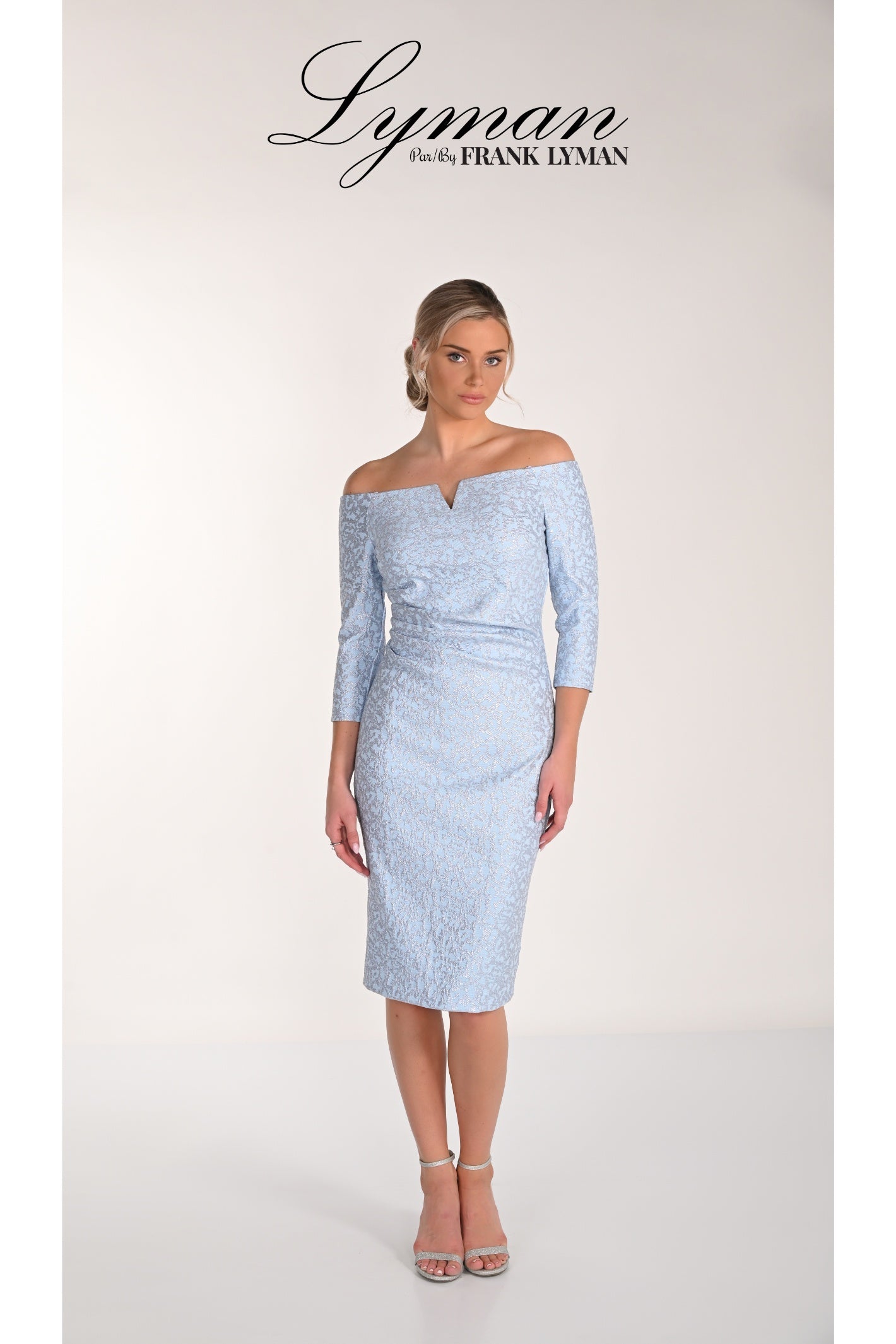 Model wearing Frank Lyman 268234 Light Blue Jacquard Off-Shoulder Dress by Frank Lyman, shop Frank Lyman at Dotique.