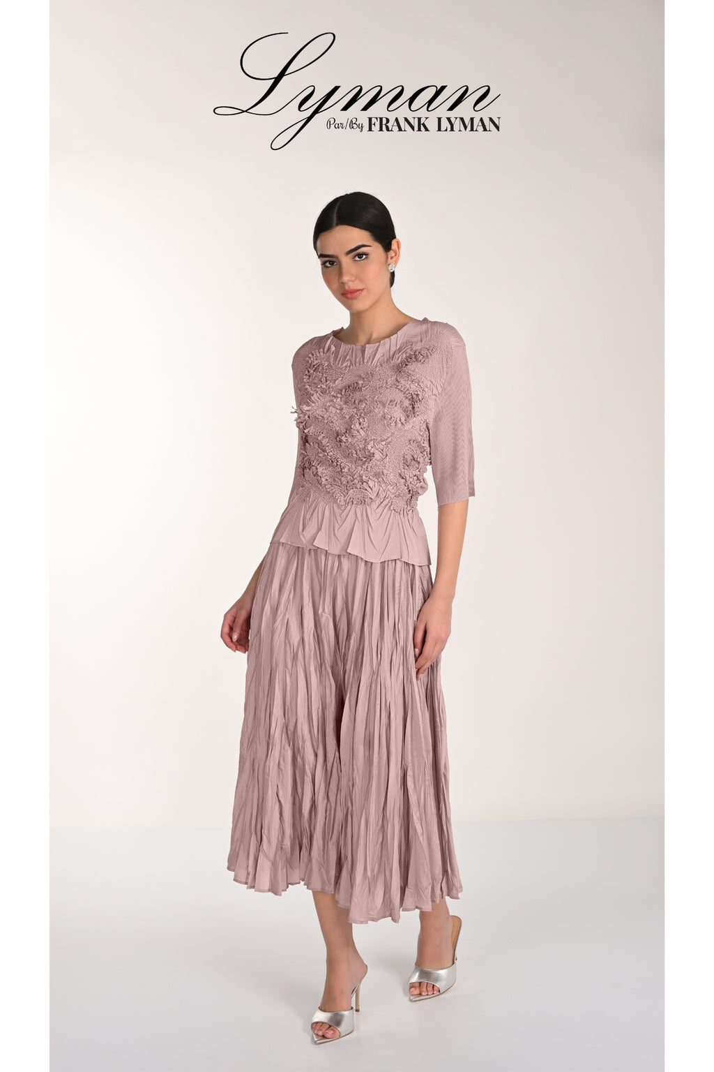 Model wearing Frank Lyman 268520 Dusty Rose Top and Skirt by Frank Lyman Shop Frank Lyman at Dotique