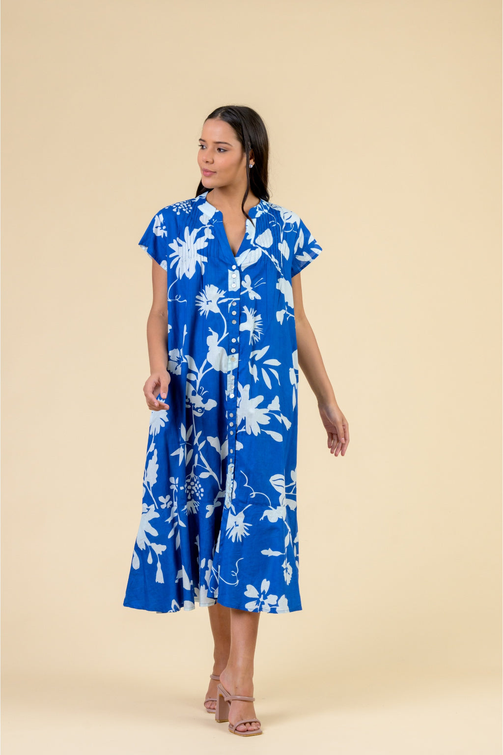 Handprint Dream Apparel AN1171A Leslie Dress Floral Blue in vibrant blue with white floral print, featuring a button front and short sleeves by Handprint Dream Apparel. Shop Handprint Dream Apparel at Dotique.