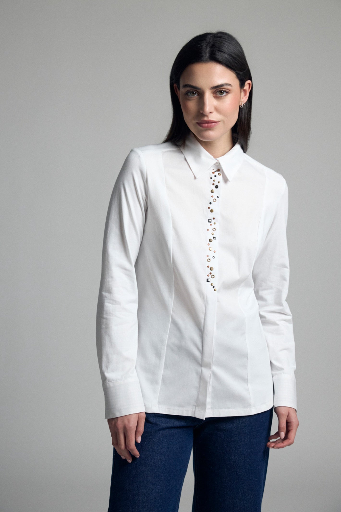 Shop the Tinta 4003401 Anayasi Women's Shirt in White at Dotique. A beautifully tailored white shirt with elegant stud detailing, a concealed button fastening and timeless styling.