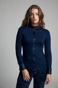 Shop the Bariloche 4007115 Andria Women's Shirt in Navy at Dotique. A fitted jersey shirt with a feminine frill neckline, satin trim and elegant styling for work and special occasions.