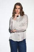 Shop the Bariloche 4007415 Begur Women's Shirt in Navy at Dotique. A beautifully feminine printed blouse with a frill neckline, relaxed fit and timeless styling for every occasion.