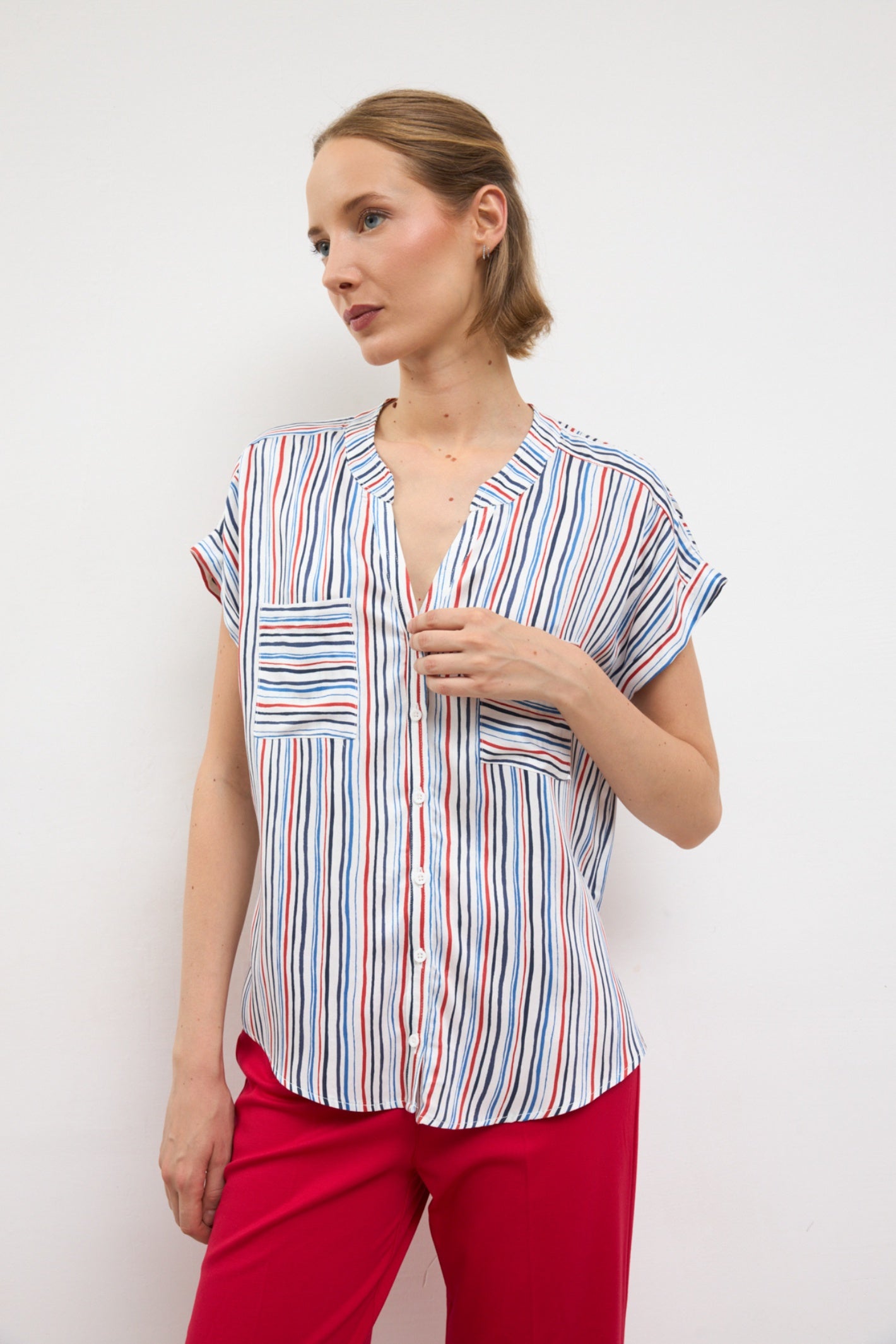 Model wearing Bariloche 3942115 Beleno Blue Shirt with vertical stripes by bariloche, shop bariloche at Dotique