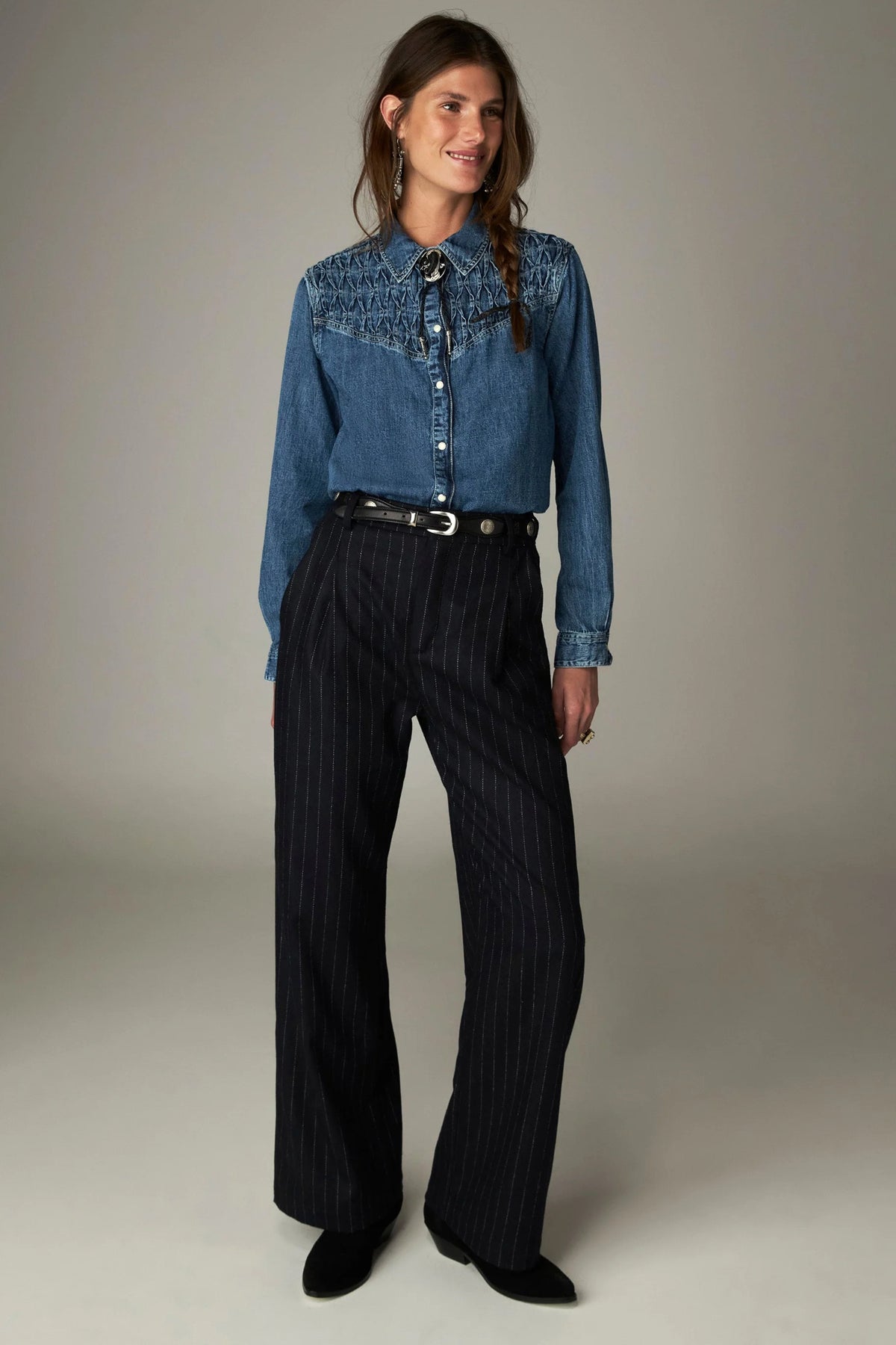 Shop the Maison Hotel Kumud Shirt in Blue Denim at Dotique. A 100% cotton denim shirt with Western-style detailing and popper buttons.