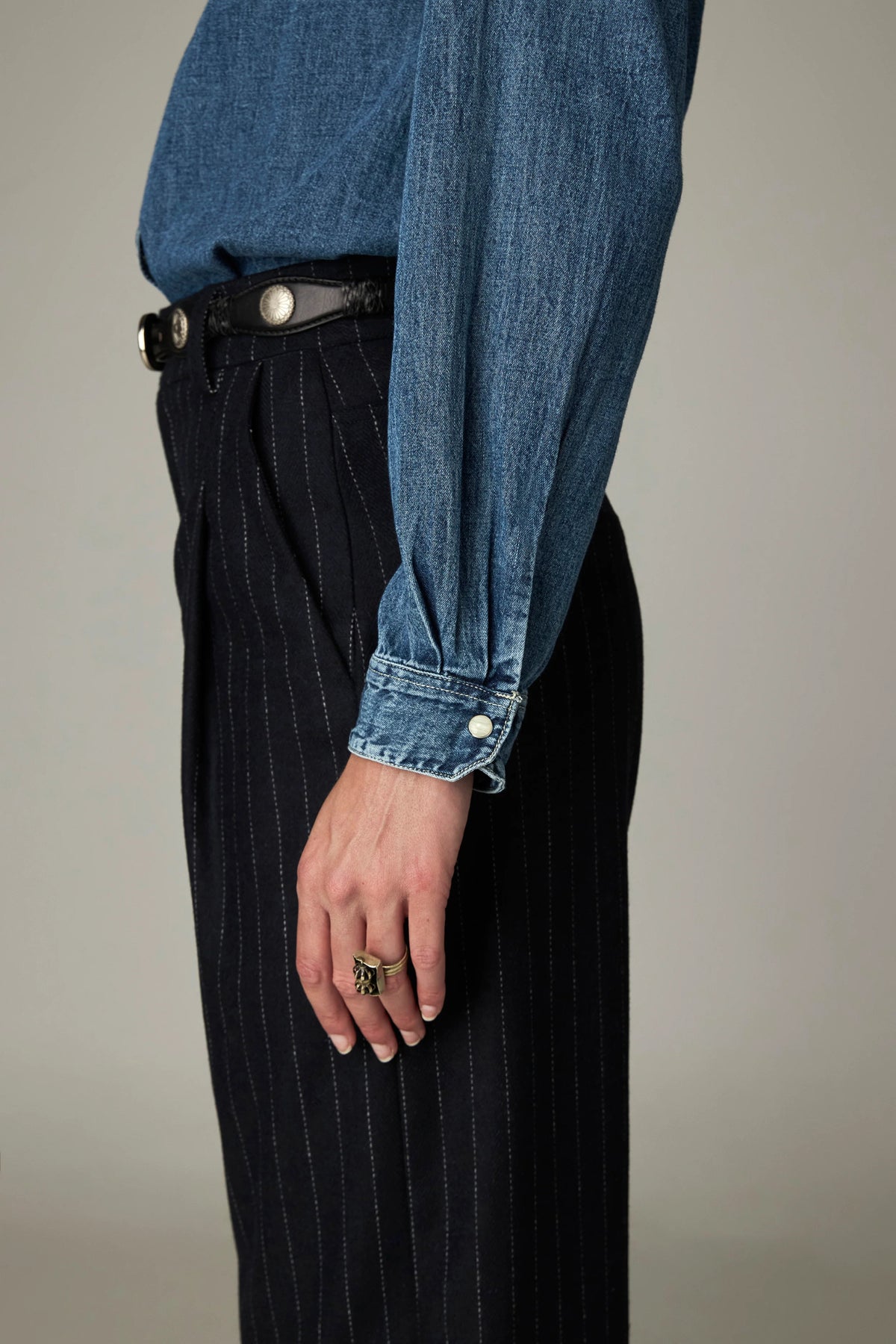 Shop the Maison Hotel Kumud Shirt in Blue Denim at Dotique. A 100% cotton denim shirt with Western-style detailing and popper buttons.