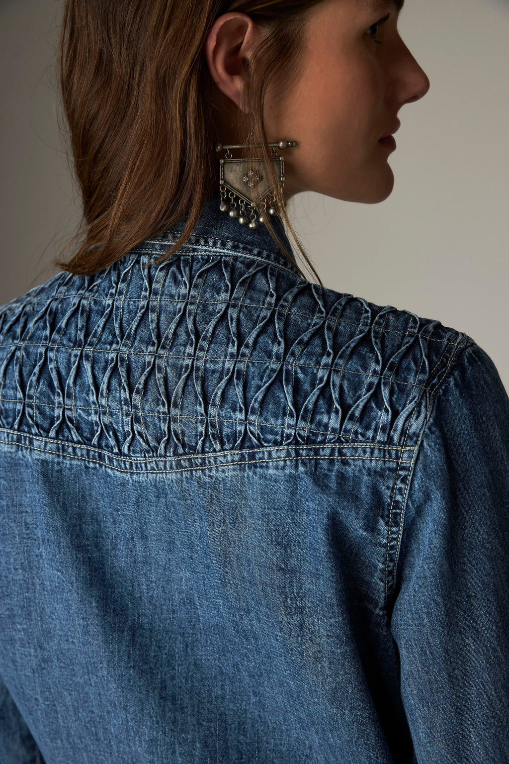 Shop the Maison Hotel Kumud Shirt in Blue Denim at Dotique. A 100% cotton denim shirt with Western-style detailing and popper buttons.