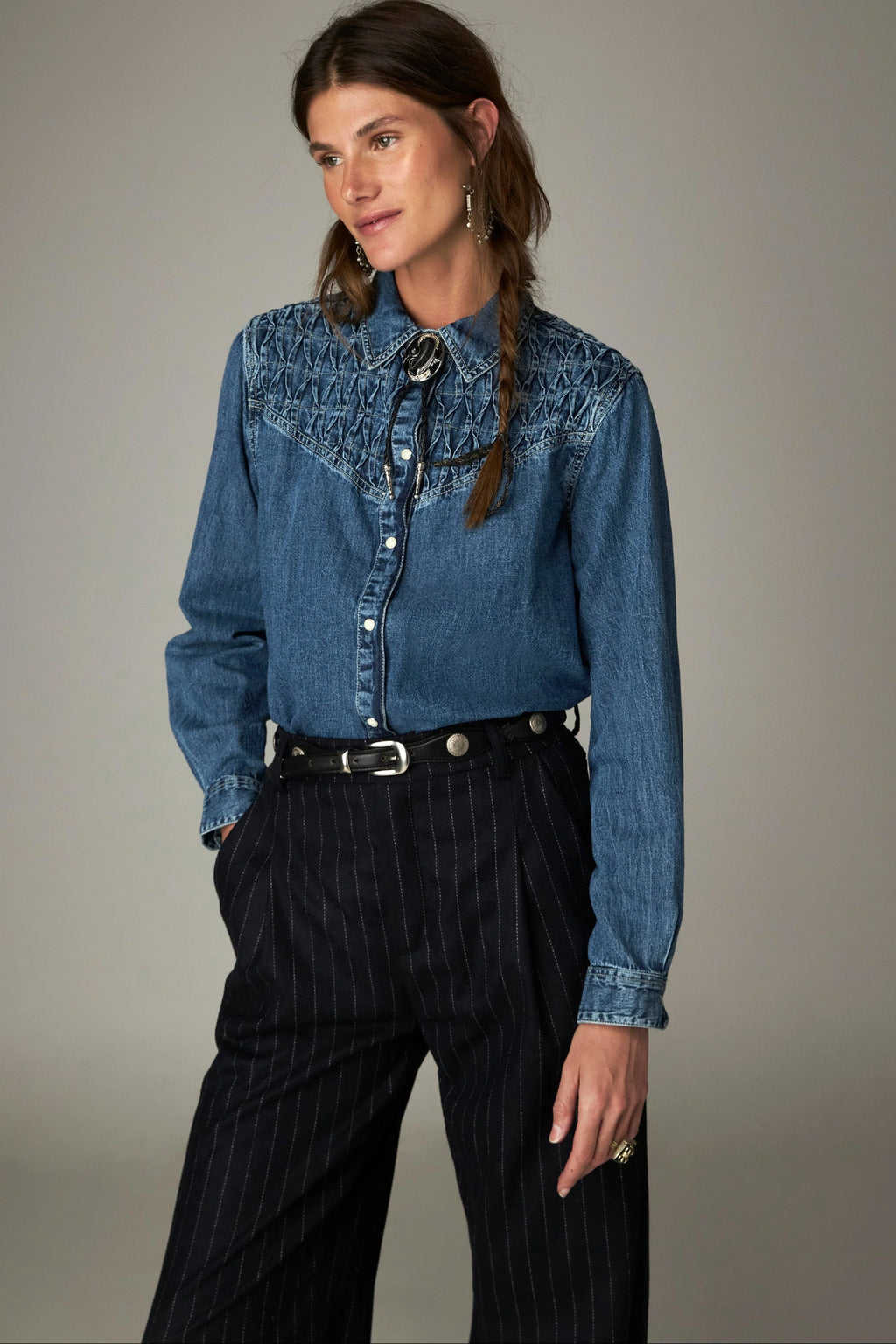 Shop the Maison Hotel Kumud Shirt in Blue Denim at Dotique. A 100% cotton denim shirt with Western-style detailing and popper buttons.