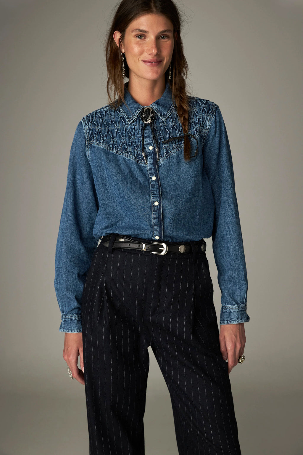 Shop the Maison Hotel Kumud Shirt in Blue Denim at Dotique. A 100% cotton denim shirt with Western-style detailing and popper buttons.