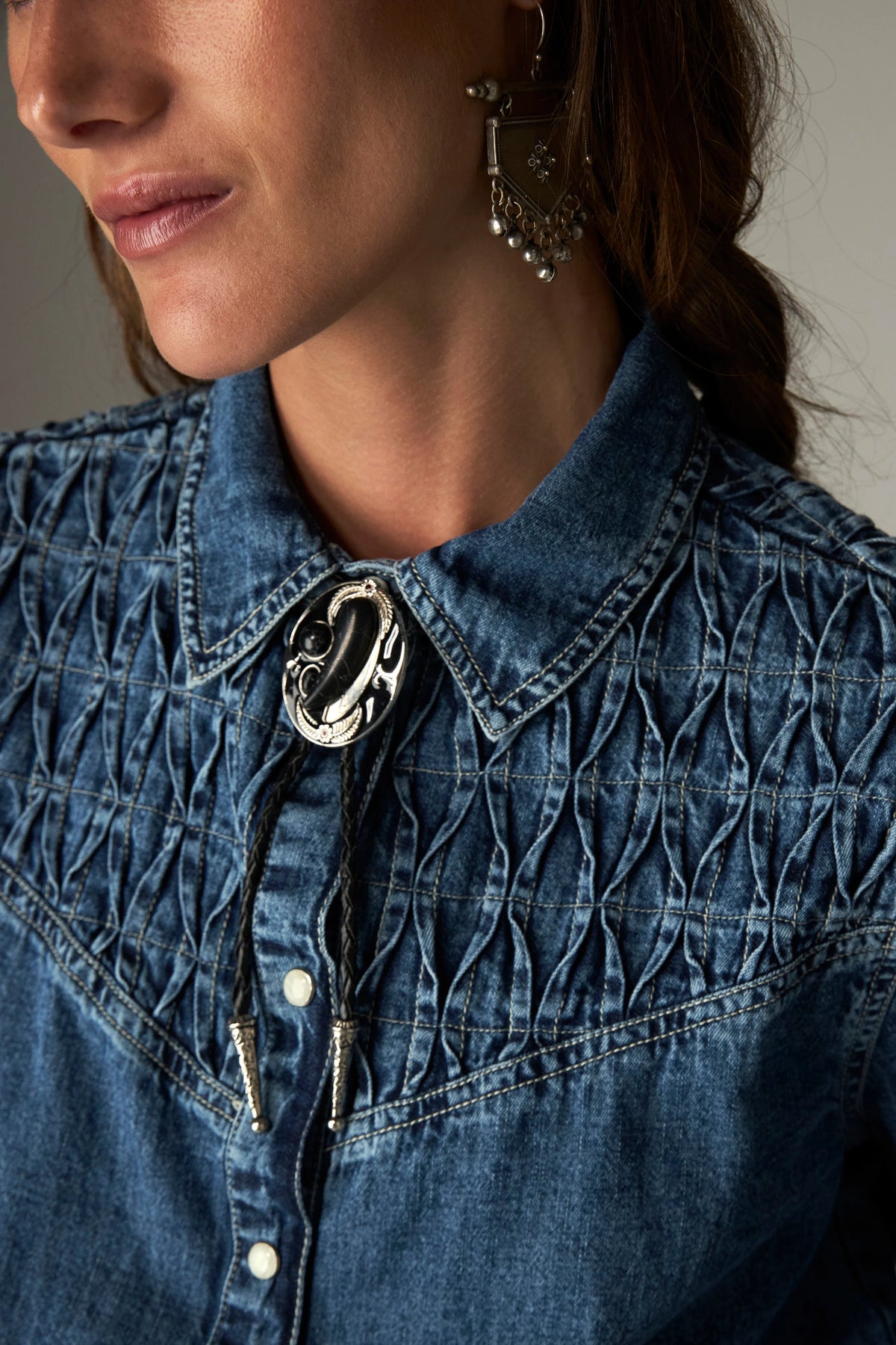 Shop the Maison Hotel Kumud Shirt in Blue Denim at Dotique. A 100% cotton denim shirt with Western-style detailing and popper buttons.