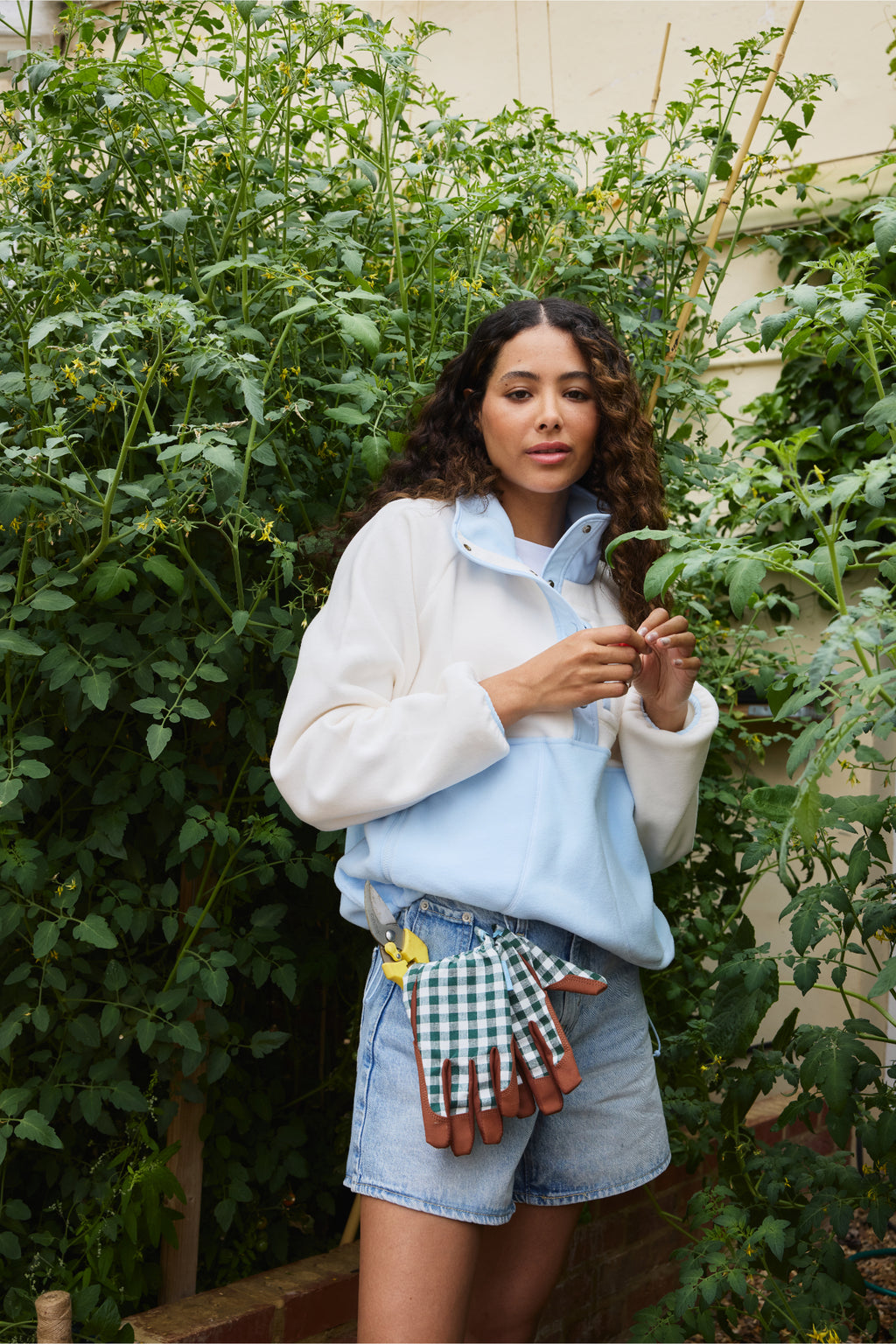 Model gardening in Gym+Coffee Snap Polar Fleece Glacial Blue greenhouse Shop Gym+Coffee at Dotique