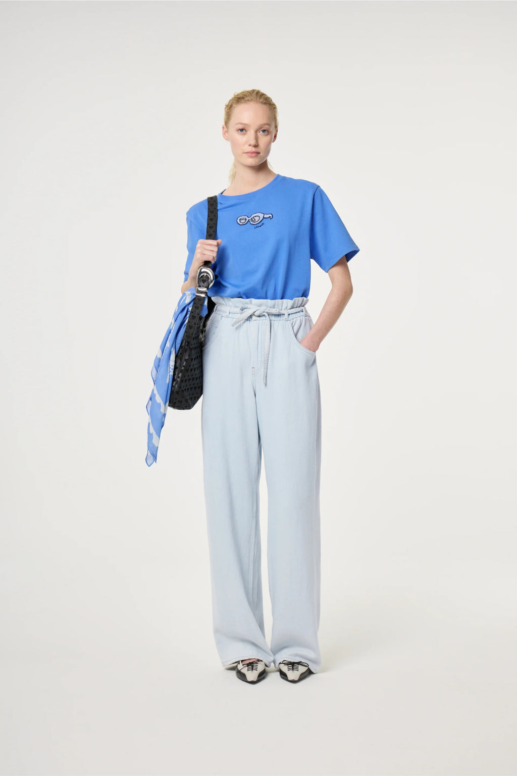 Woman wearing Fabienne Chapot Pearl T-shirt Marina Blue by Fabienne Chapot, shop Fabienne Chapot at Dotique.