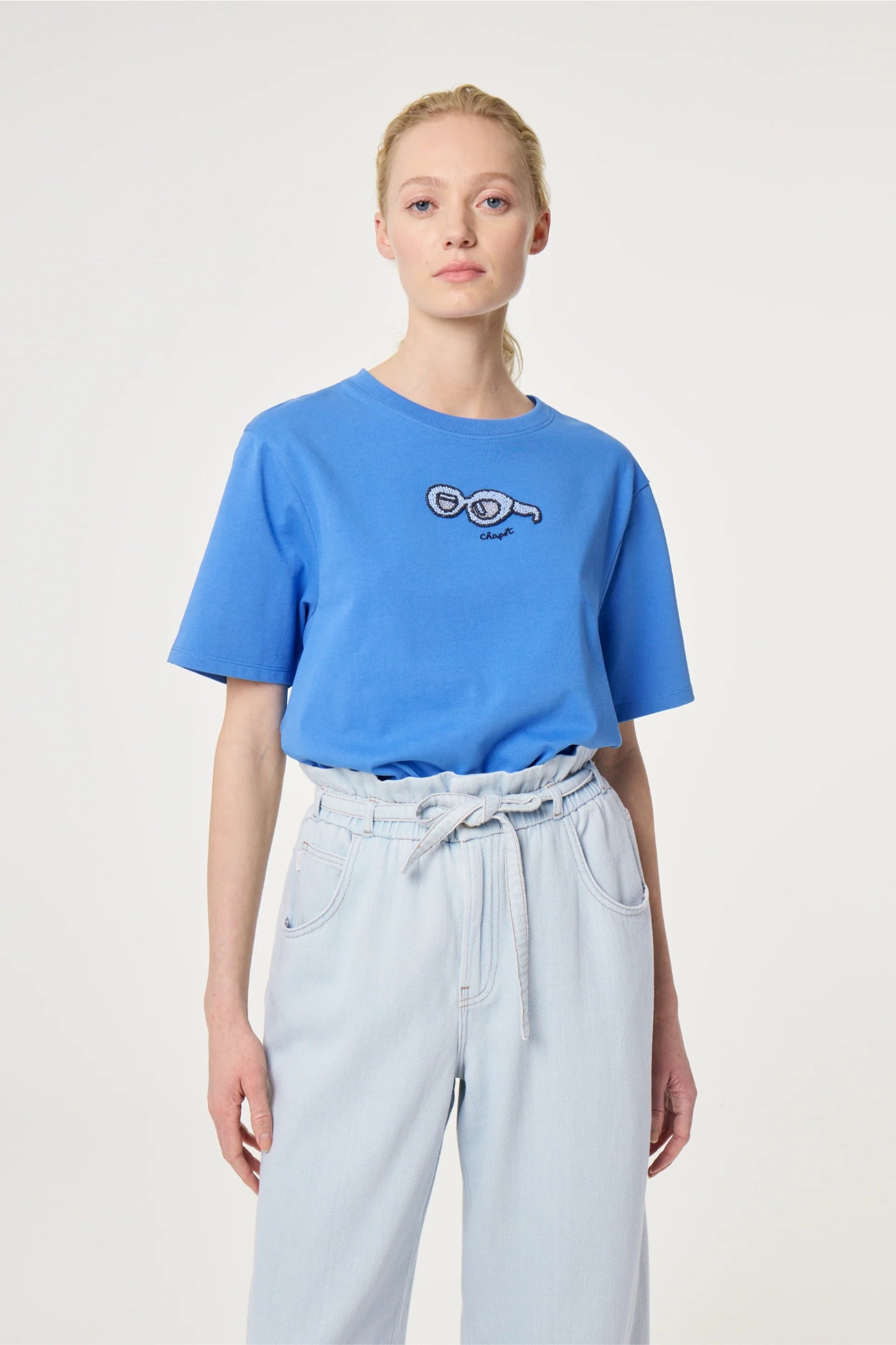 Woman wearing Fabienne Chapot Pearl T-shirt Marina Blue by Fabienne Chapot, shop Fabienne Chapot at Dotique.