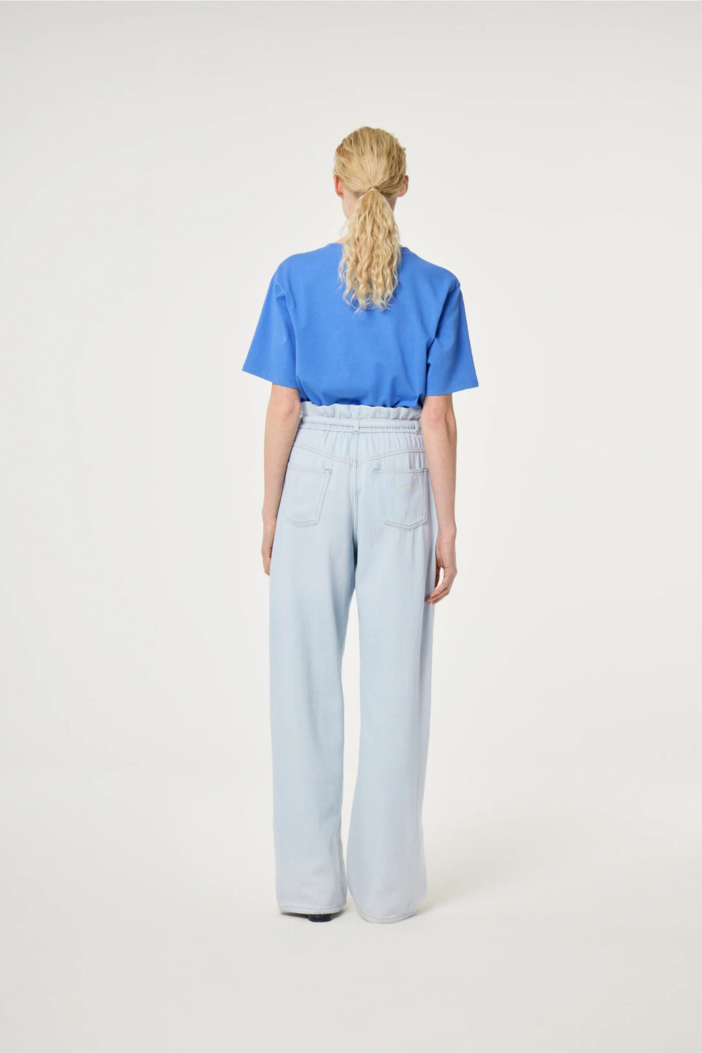 Back view of model wearing Fabienne Chapot Pearl T-shirt Marina Blue by Fabienne Chapot, shop Fabienne Chapot at Dotique