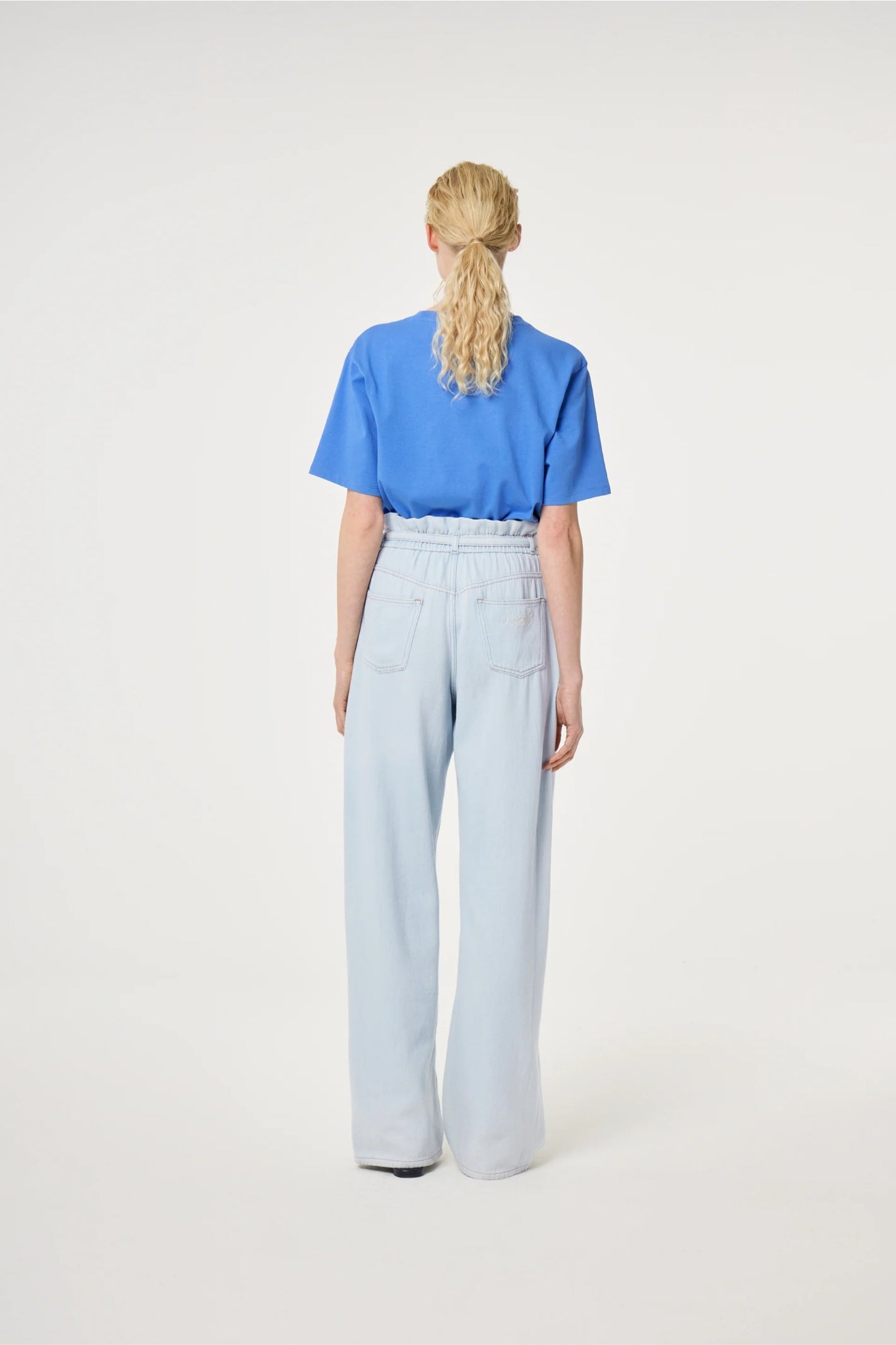 Back view of model wearing Fabienne Chapot Pearl T-shirt Marina Blue by Fabienne Chapot, shop Fabienne Chapot at Dotique