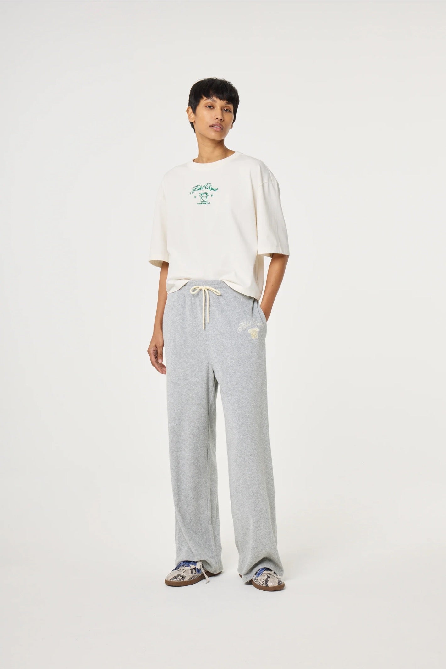 Model wearing Fabienne Chapot Benja T-shirt Cosy White/Green by Fabienne Chapot Shop Fabienne Chapot at Dotique