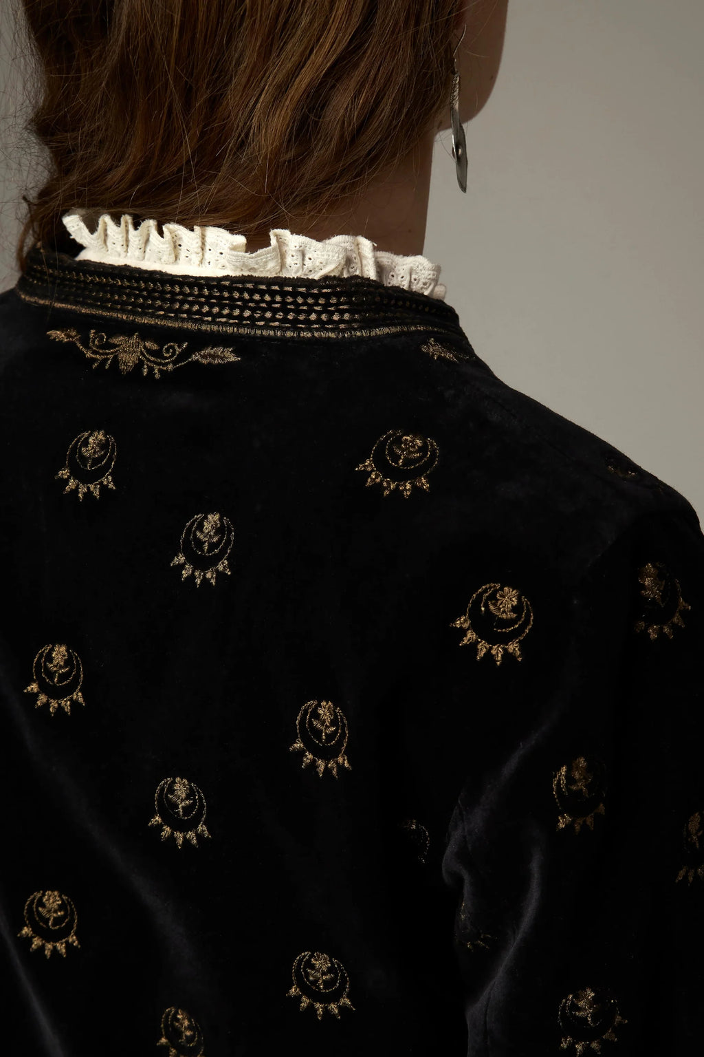 Shop the Maison Hotel Luna Jacket in Golden Stars at Dotique. A black velvet jacket with metallic star embroidery, statement buttons and patch pockets.