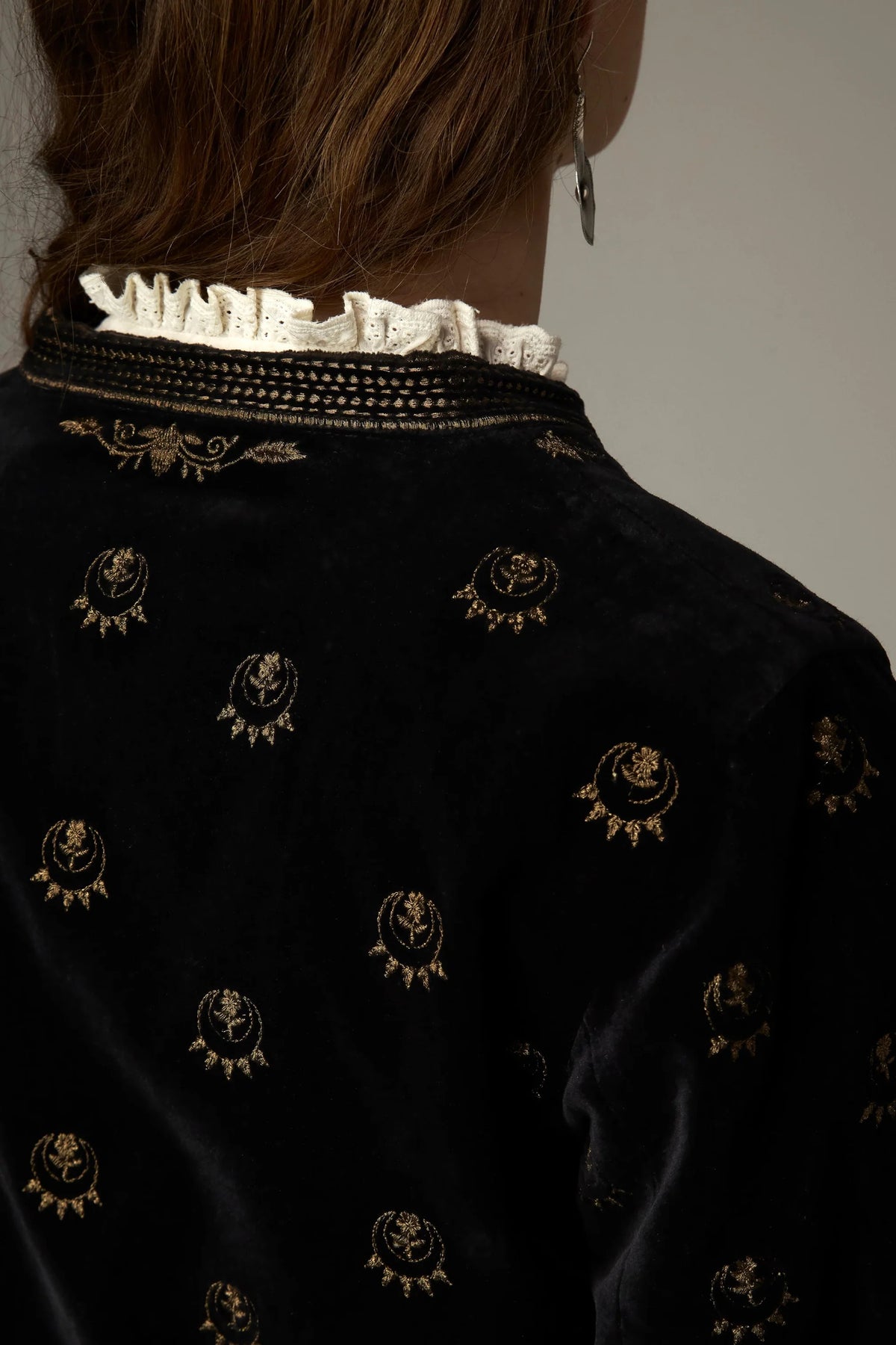 Shop the Maison Hotel Luna Jacket in Golden Stars at Dotique. A black velvet jacket with metallic star embroidery, statement buttons and patch pockets.