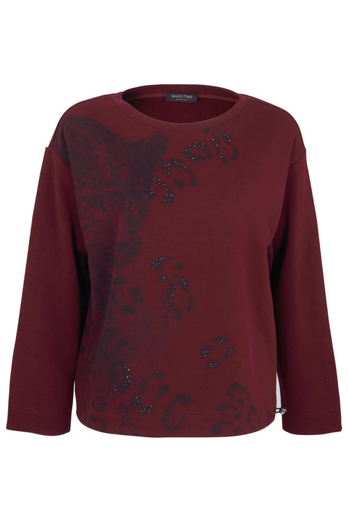 Burgundy sweatshirt with dark embellished animal motif and drawstring hem. Shop Margittes at Dotique.
