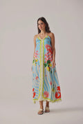 Model wearing Noib Riva Coverup – Summer Zest with colorful seashell and floral print by Noib. Shop Noib at Dotique.