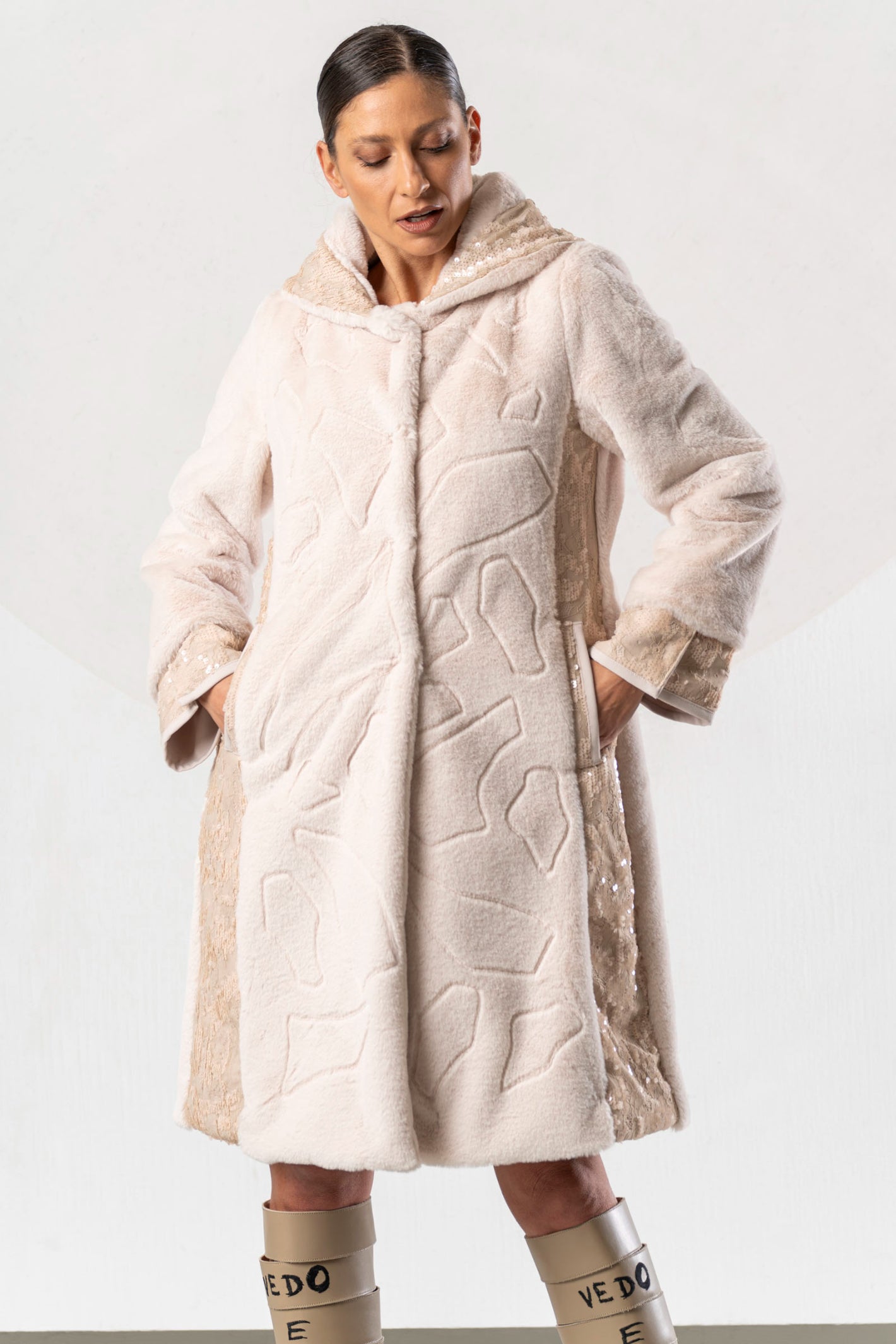 Discover the Elisa Cavaletti EJW268030100 Powder Pink Coat at Dotique. A luxurious long designer coat with beautiful mixed textures from AW26.