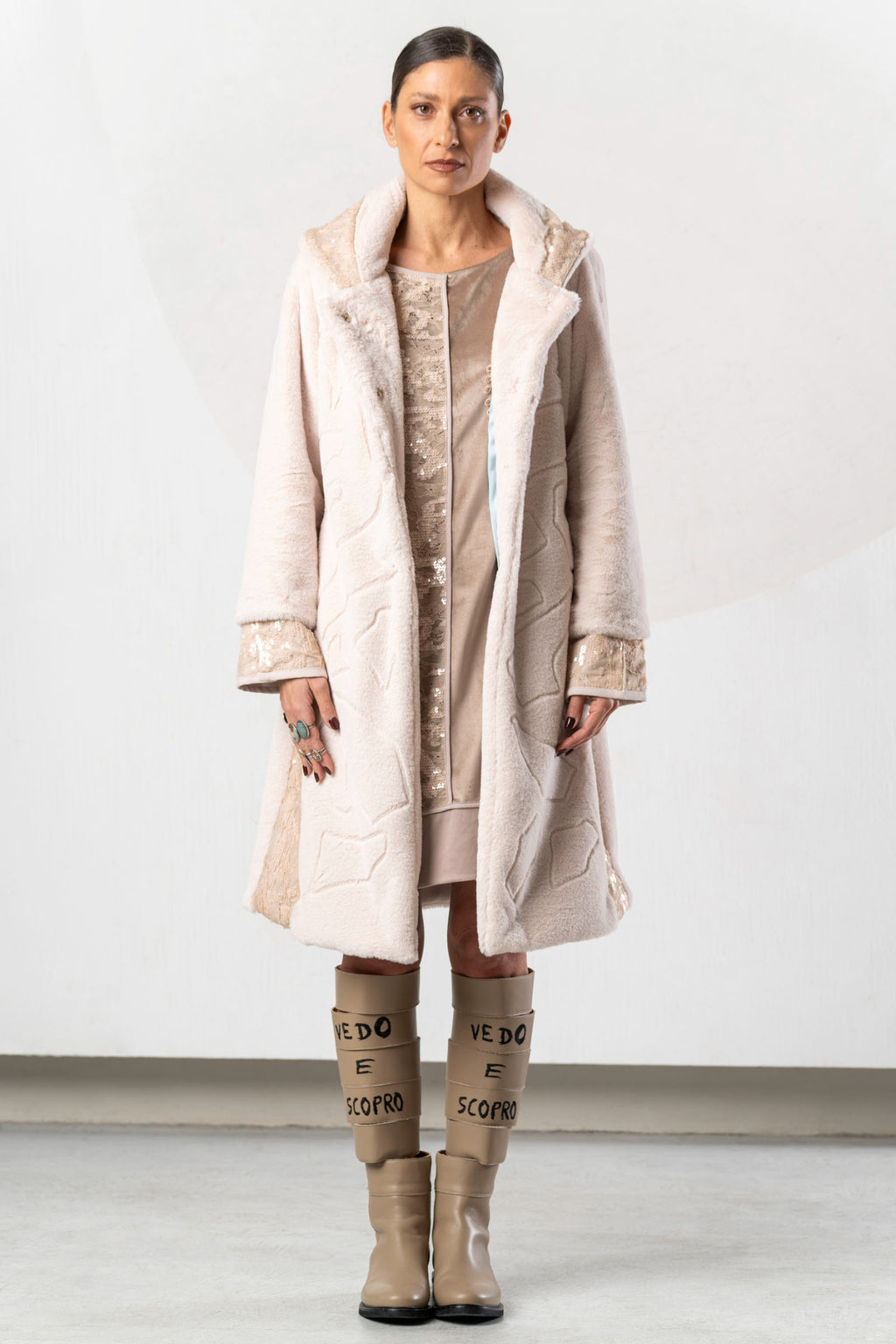 Discover the Elisa Cavaletti EJW268030100 Powder Pink Coat at Dotique. A luxurious long designer coat with beautiful mixed textures from AW26.