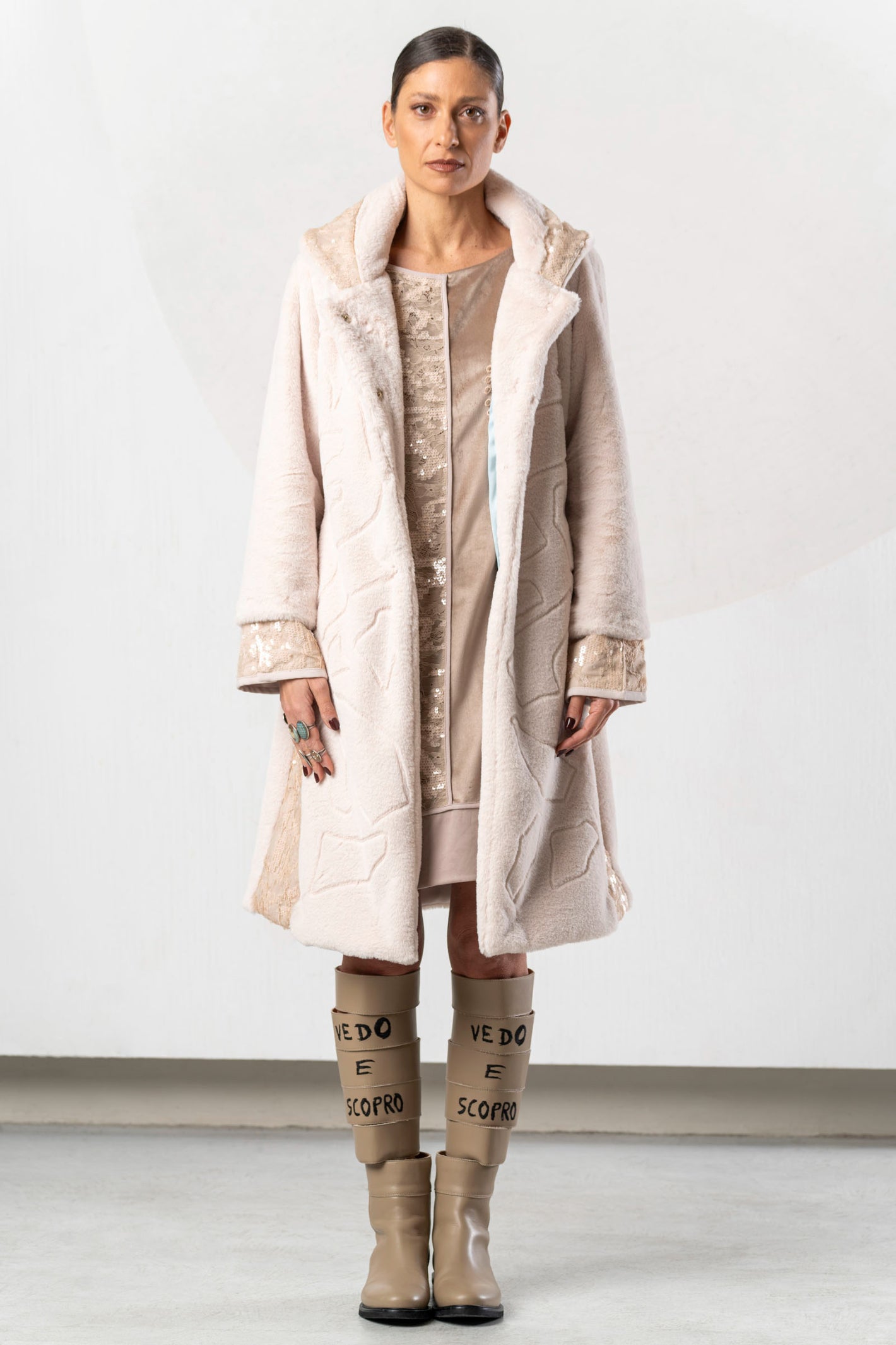 Discover the Elisa Cavaletti EJW268030100 Powder Pink Coat at Dotique. A luxurious long designer coat with beautiful mixed textures from AW26.