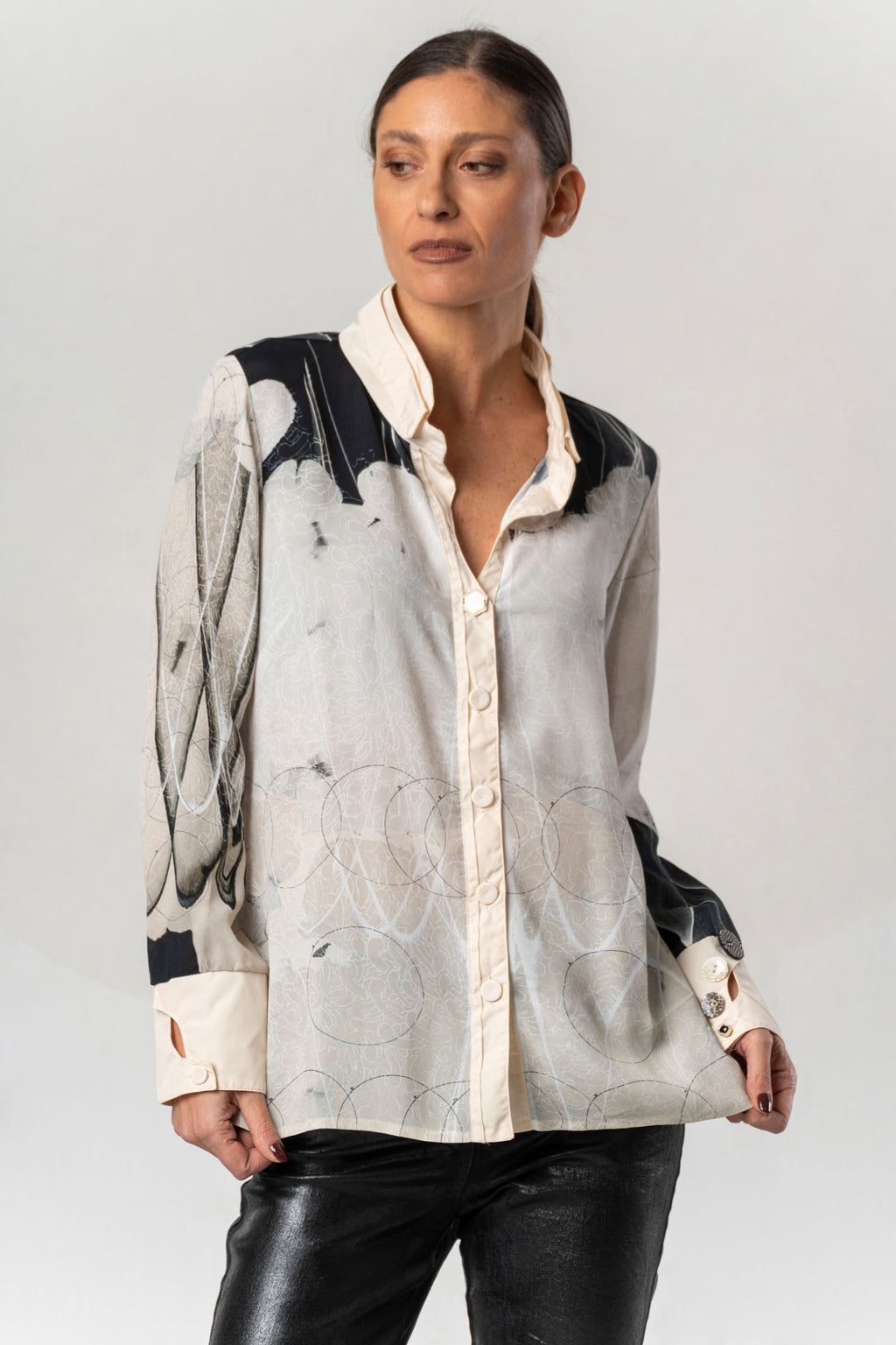 Discover the Elisa Cavaletti ELW261017209 Blouse at Dotique. A premium black and ivory printed blouse with fluid viscose and distinctive detailing.