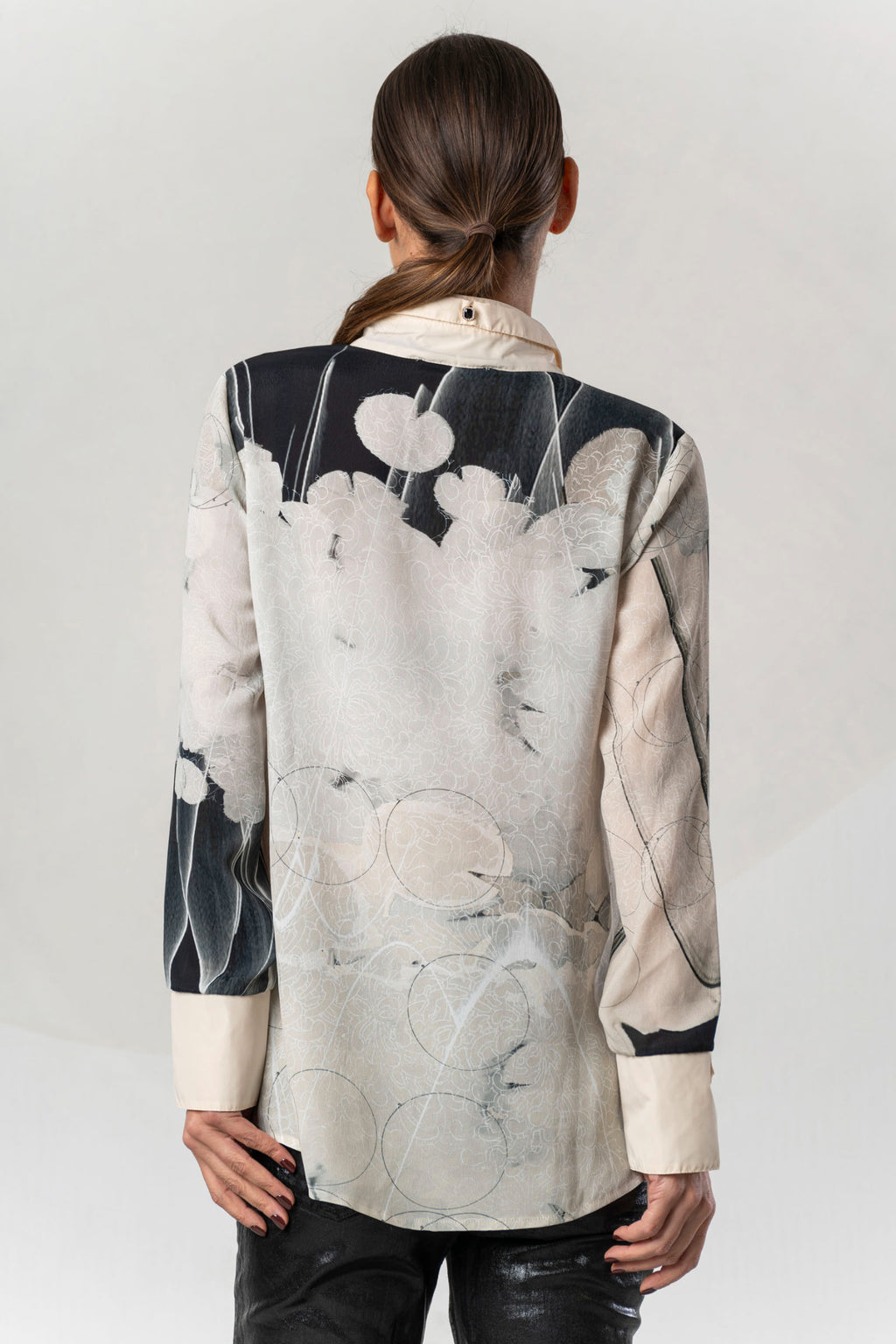 Discover the Elisa Cavaletti ELW261017209 Blouse at Dotique. A premium black and ivory printed blouse with fluid viscose and distinctive detailing.