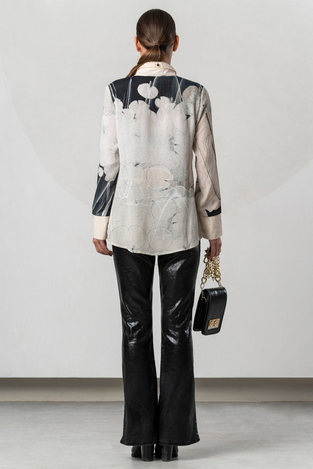 Discover the Elisa Cavaletti ELW261017209 Blouse at Dotique. A premium black and ivory printed blouse with fluid viscose and distinctive detailing.