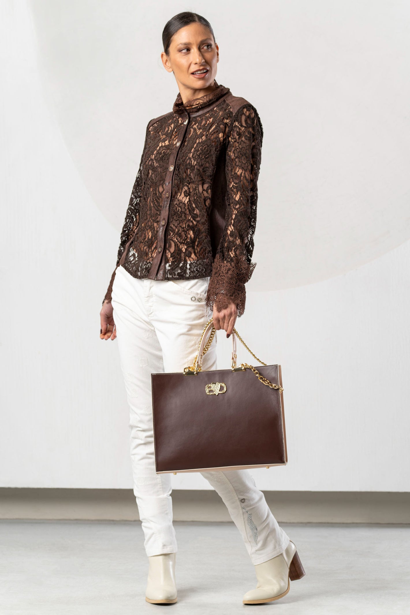 Discover the Elisa Cavaletti ELW261022604 Brown Blouse at Dotique. A premium Italian designer blouse with beautiful detailing in rich chocolate brown.