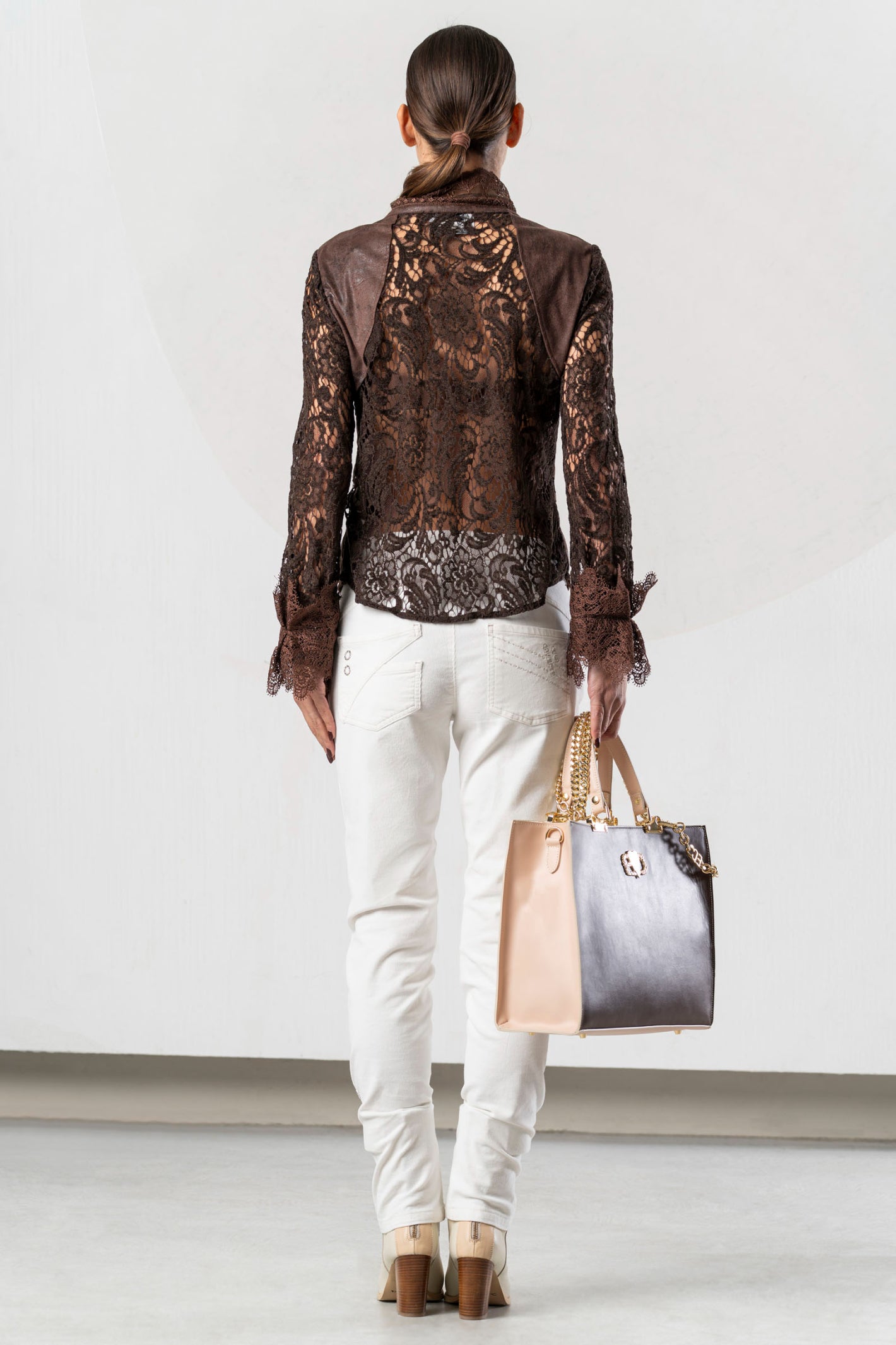 Discover the Elisa Cavaletti ELW261022604 Brown Blouse at Dotique. A premium Italian designer blouse with beautiful detailing in rich chocolate brown.