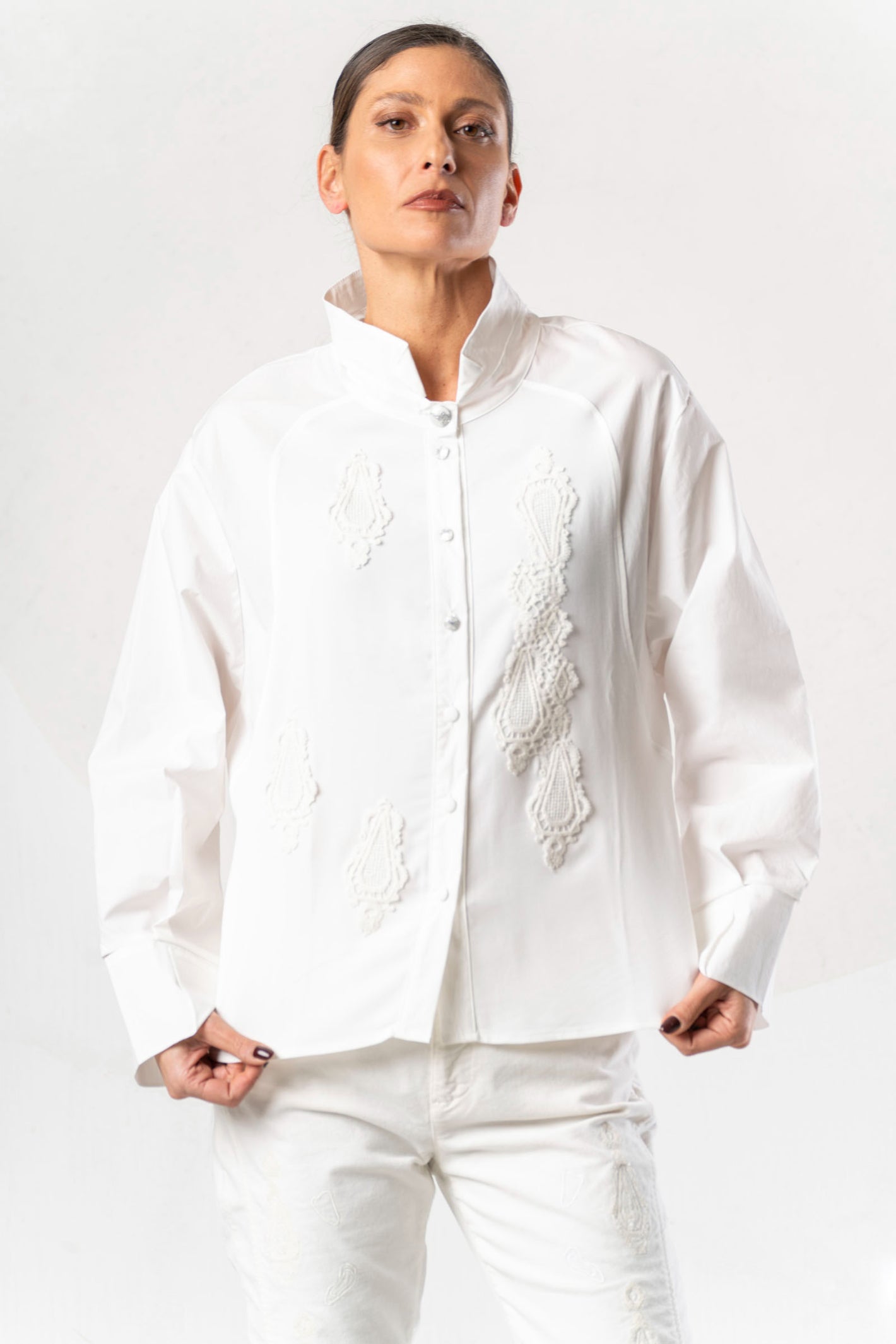 Shop the Elisa Cavaletti ELW261029800 Off White Blouse at Dotique. A premium Italian designer blouse with beautiful detailing for AW26.