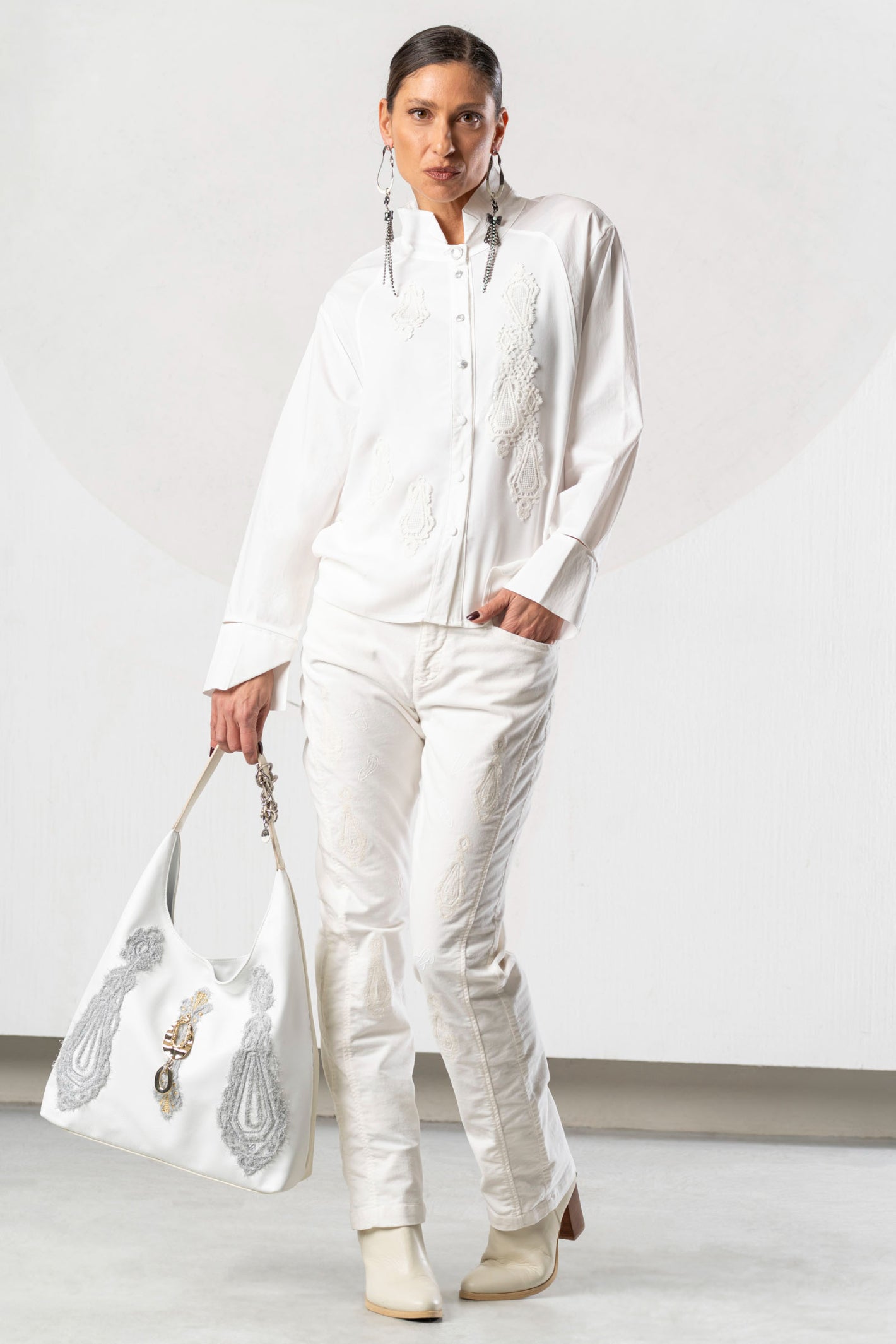 Shop the Elisa Cavaletti ELW261029800 Off White Blouse at Dotique. A premium Italian designer blouse with beautiful detailing for AW26.