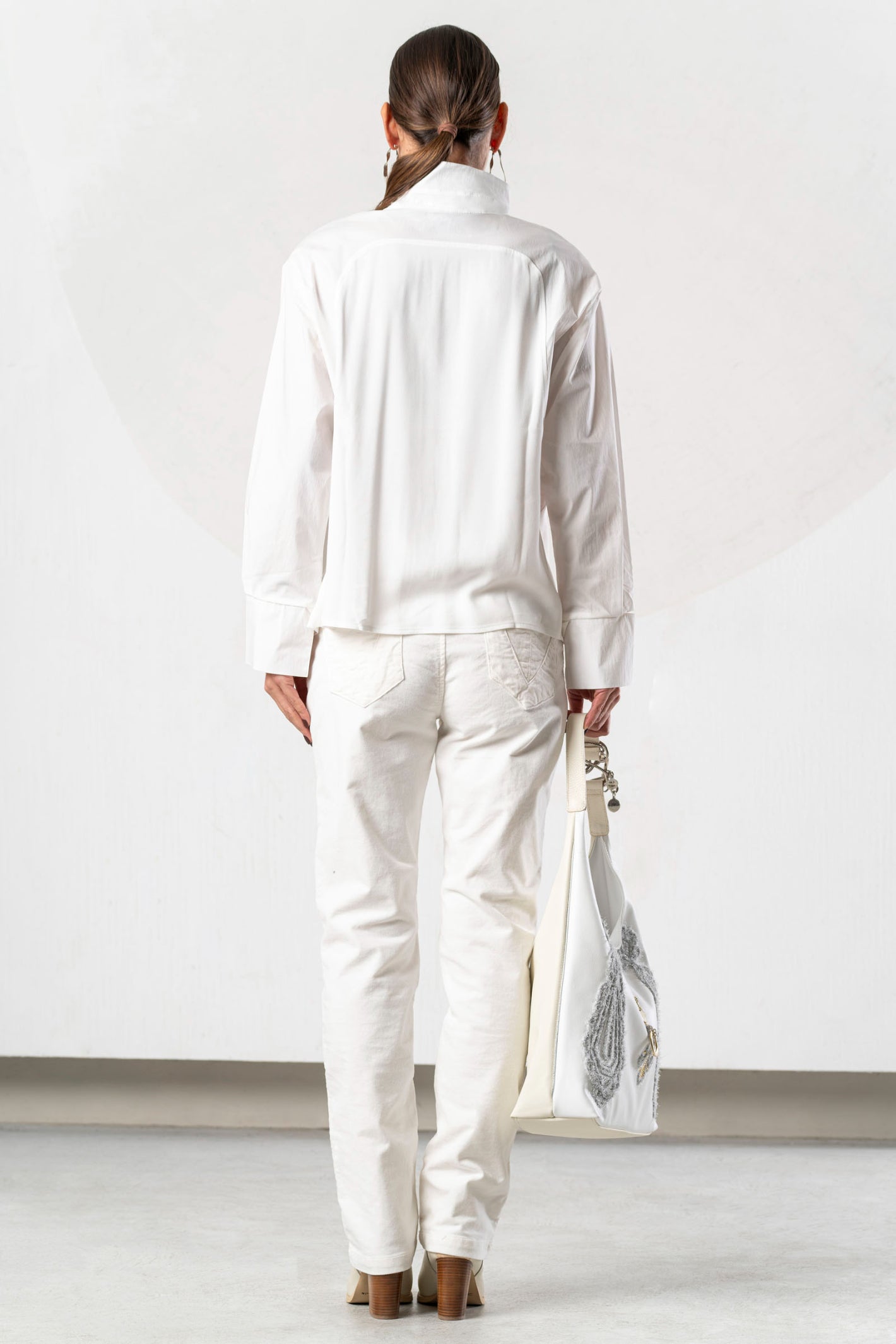 Shop the Elisa Cavaletti ELW261029800 Off White Blouse at Dotique. A premium Italian designer blouse with beautiful detailing for AW26.