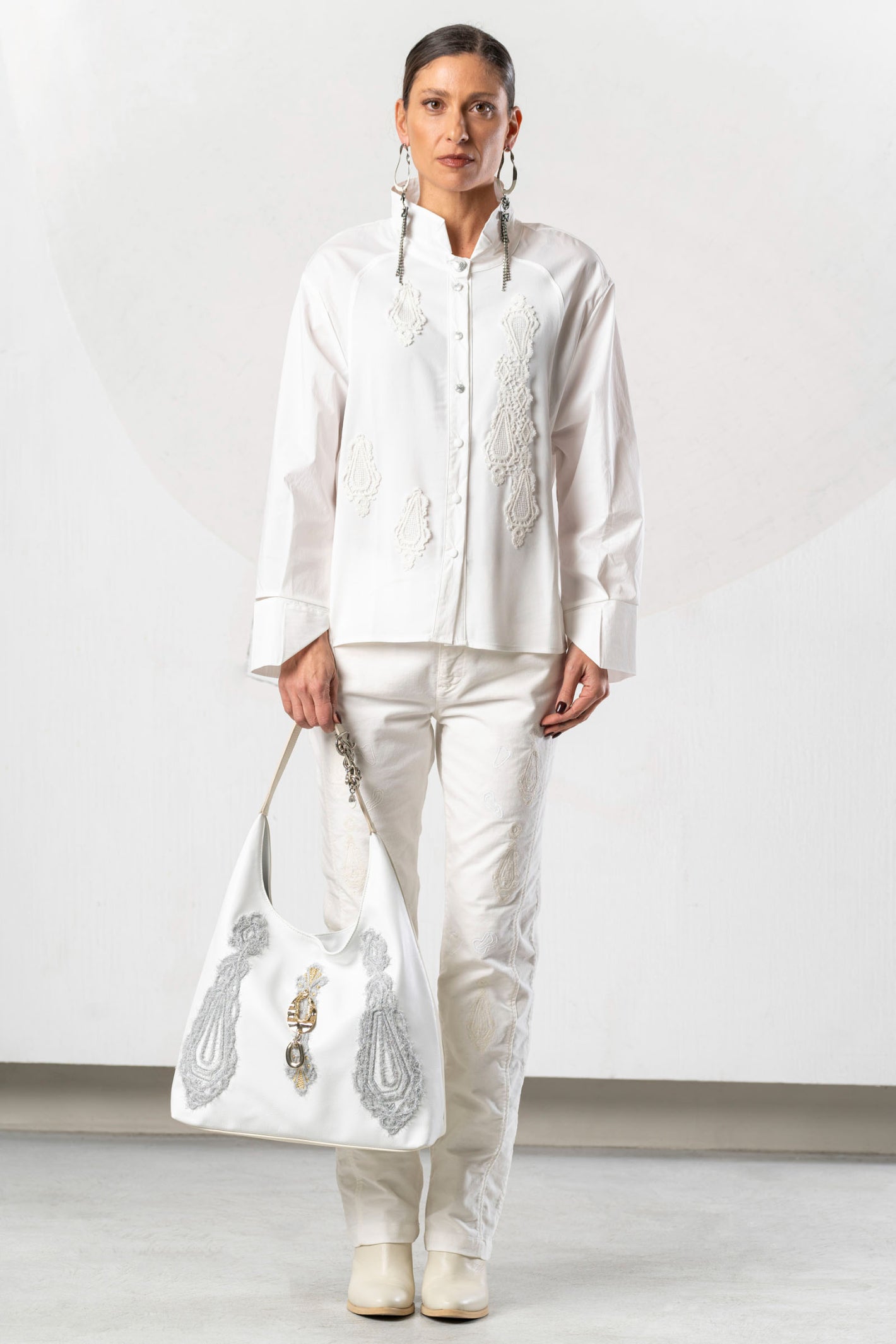 Shop the Elisa Cavaletti ELW261029800 Off White Blouse at Dotique. A premium Italian designer blouse with beautiful detailing for AW26.