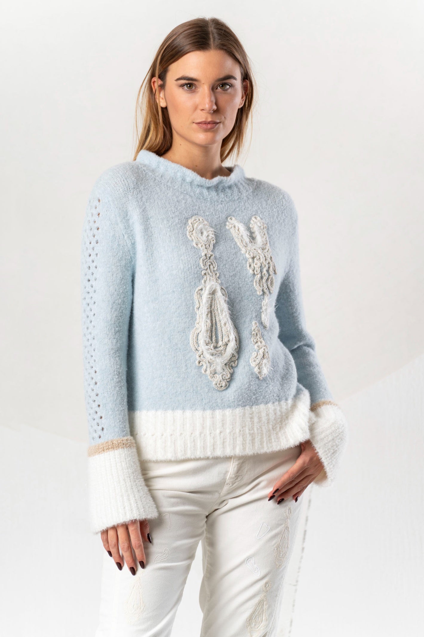 Shop the Elisa Cavaletti ELW264011806 Light Blue Jumper at Dotique. Premium Italian knitwear in a beautiful soft blue with wool and metallic detail.