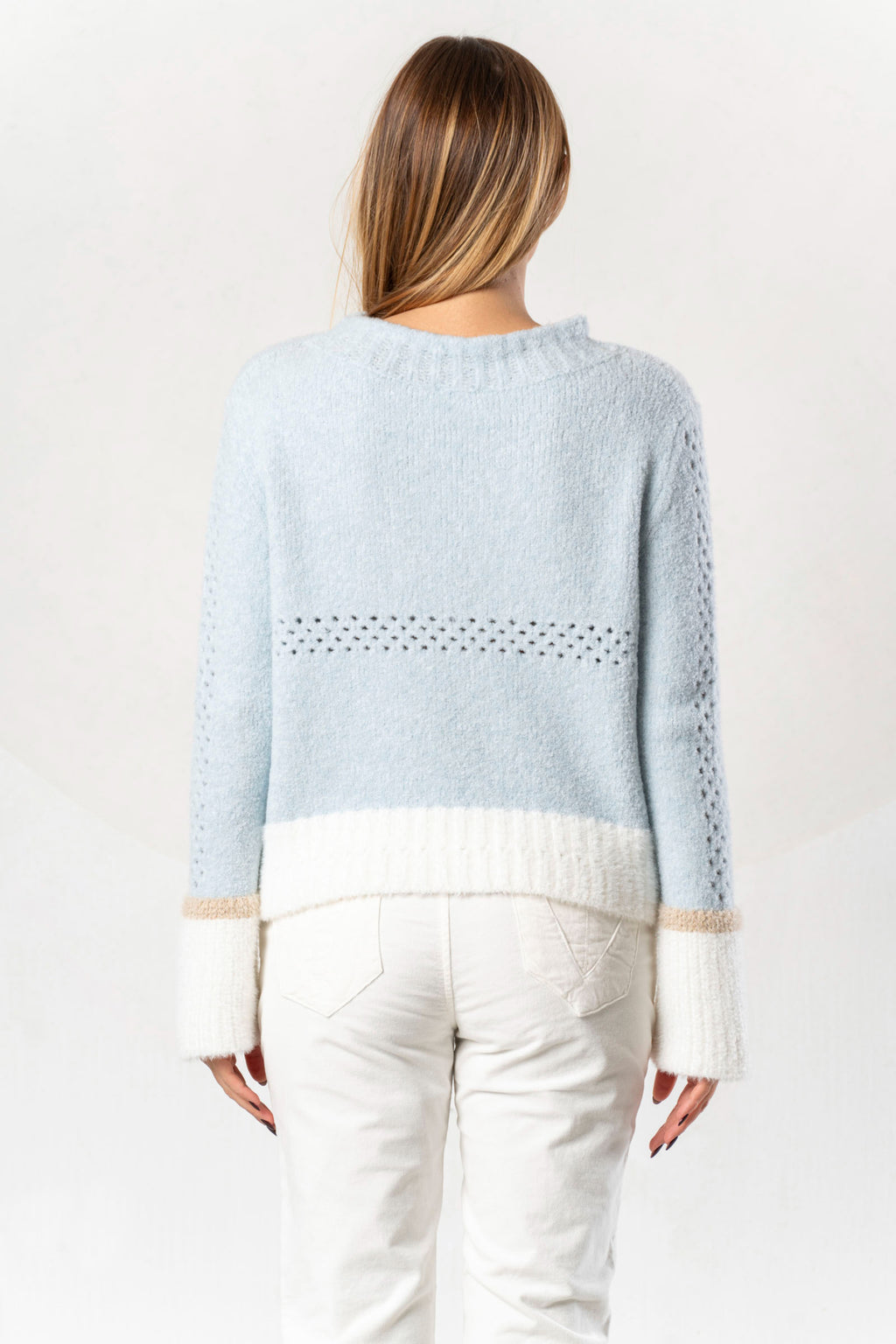 Shop the Elisa Cavaletti ELW264011806 Light Blue Jumper at Dotique. Premium Italian knitwear in a beautiful soft blue with wool and metallic detail.