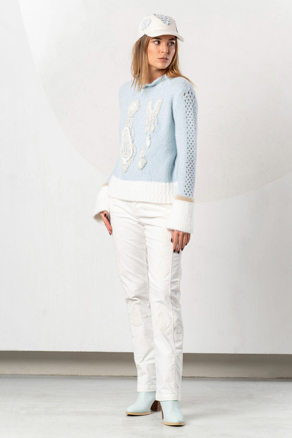 Shop the Elisa Cavaletti ELW264011806 Light Blue Jumper at Dotique. Premium Italian knitwear in a beautiful soft blue with wool and metallic detail.
