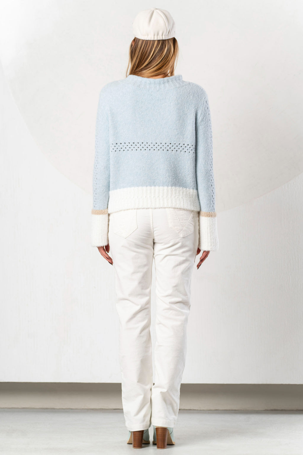 Shop the Elisa Cavaletti ELW264011806 Light Blue Jumper at Dotique. Premium Italian knitwear in a beautiful soft blue with wool and metallic detail.