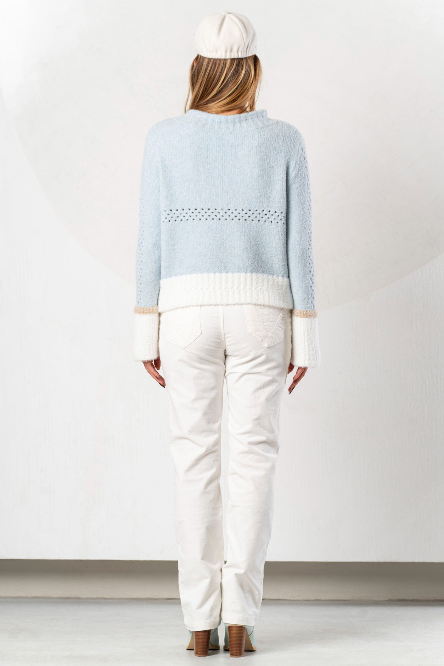 Shop the Elisa Cavaletti ELW264011806 Light Blue Jumper at Dotique. Premium Italian knitwear in a beautiful soft blue with wool and metallic detail.