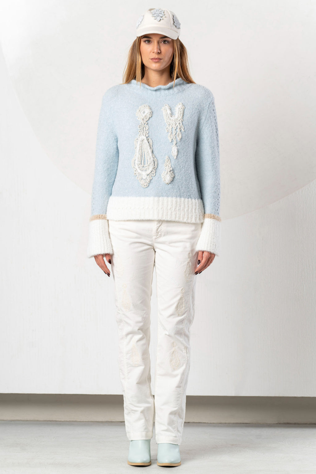 Shop the Elisa Cavaletti ELW264011806 Light Blue Jumper at Dotique. Premium Italian knitwear in a beautiful soft blue with wool and metallic detail.