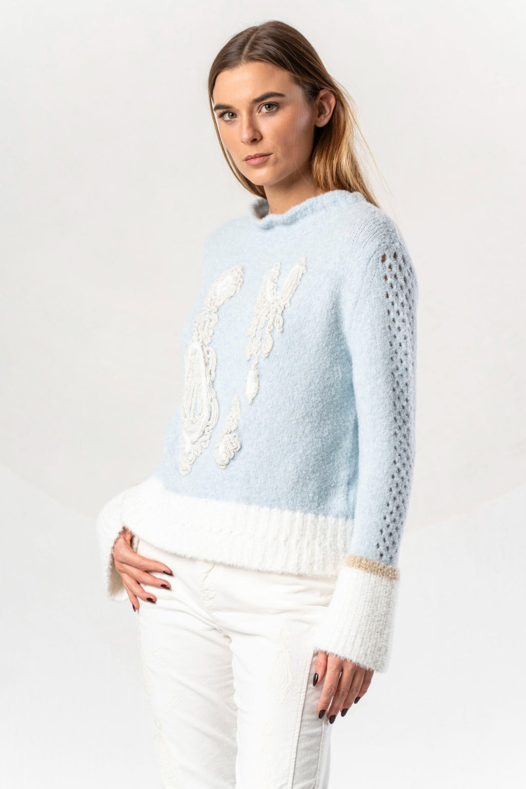Shop the Elisa Cavaletti ELW264011806 Light Blue Jumper at Dotique. Premium Italian knitwear in a beautiful soft blue with wool and metallic detail.