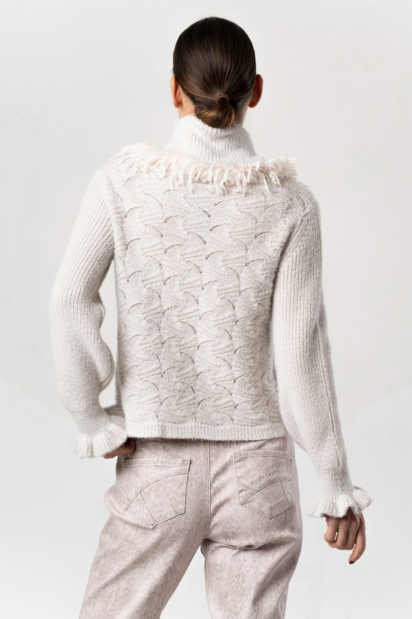 Shop the Elisa Cavaletti ELW264038801 Beige Jumper at Dotique. A premium Italian wool-blend knit with beautiful texture and a cosy high neckline.