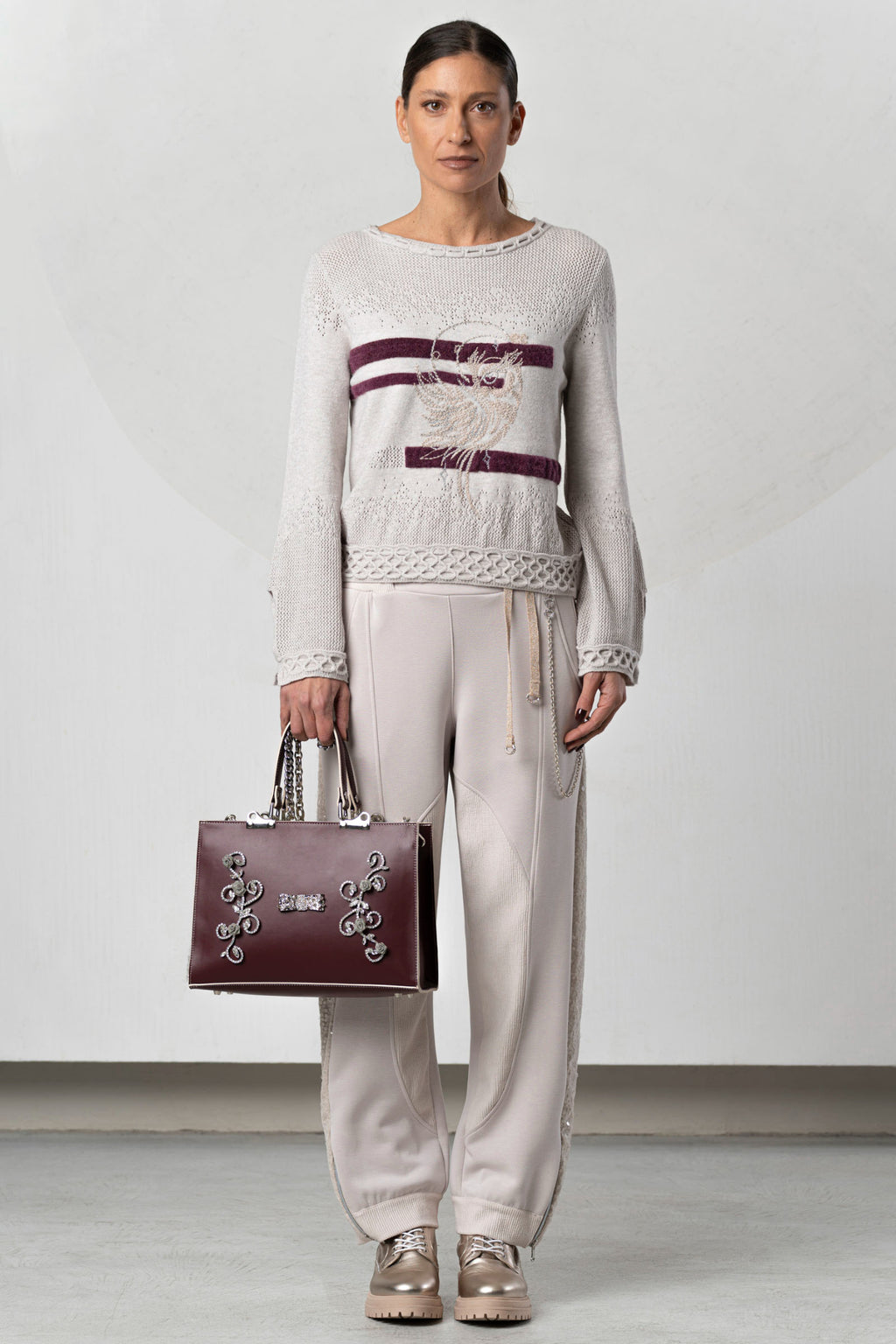 Discover the Elisa Cavaletti ELW264038805 Jumper at Dotique. Premium Italian knitwear in beige and bordeaux with distinctive AW26 detailing.